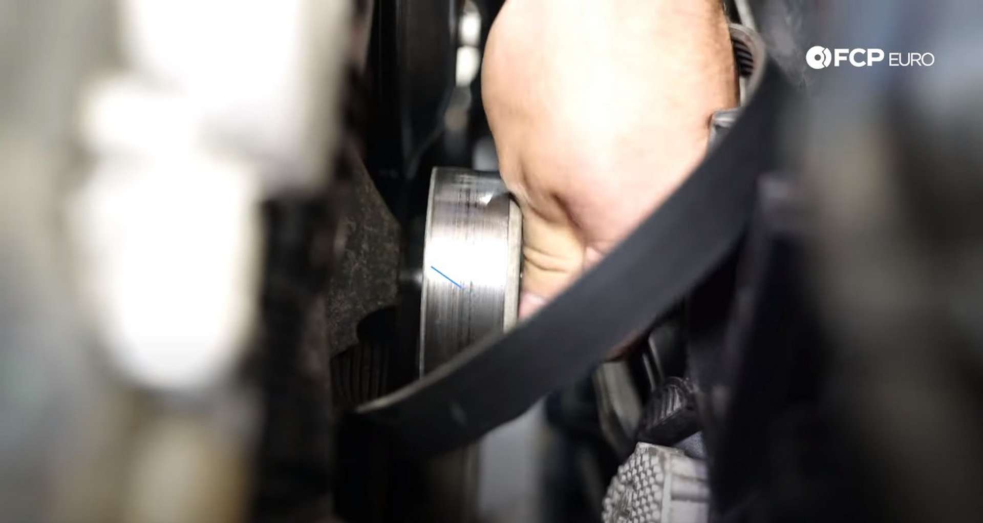 DIY Audi B8.5 Water Pump and Thermostat Replacement loosening the accessory belt idler