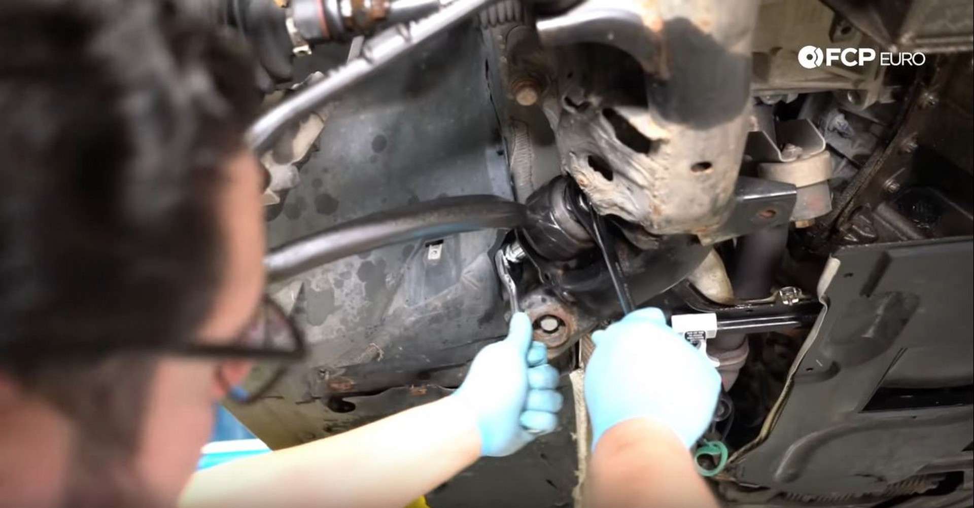 BMW Front Suspension Refresh removing tension strut mounting bolt