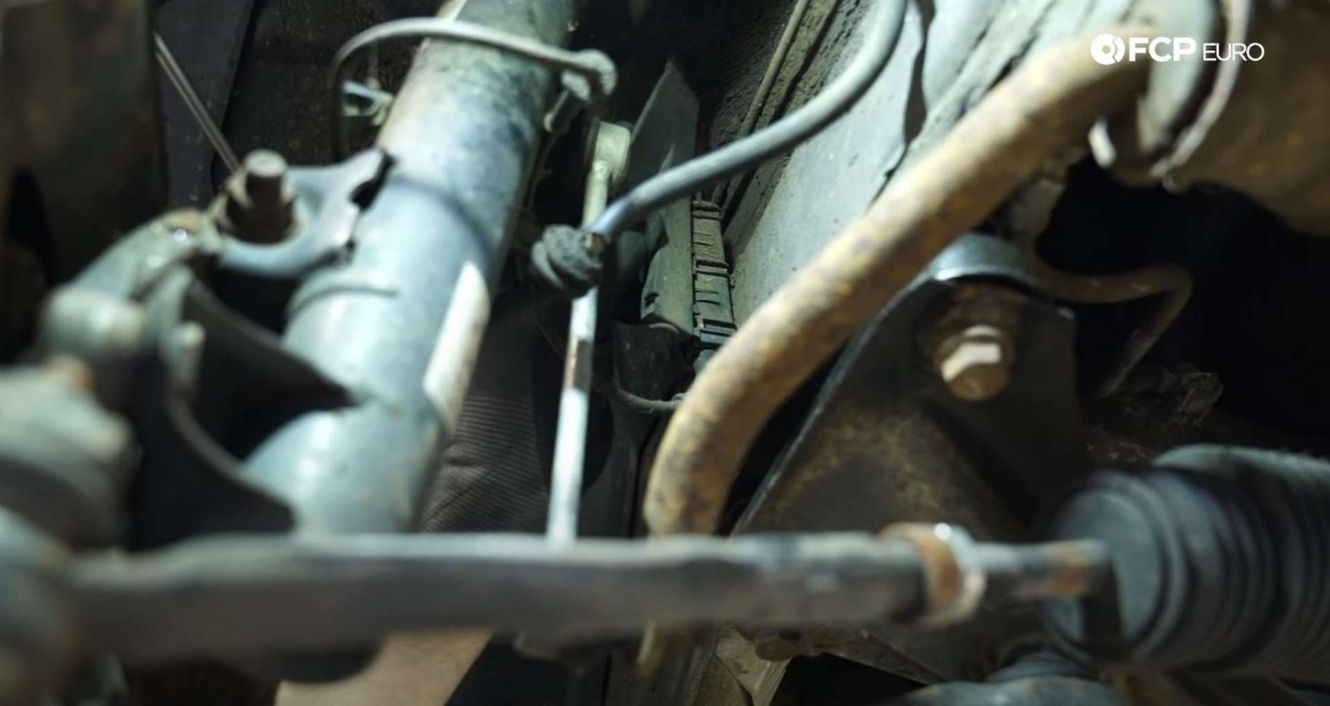 DIY BMW E36 Coilovers disconnecting the wheel speed sensor
