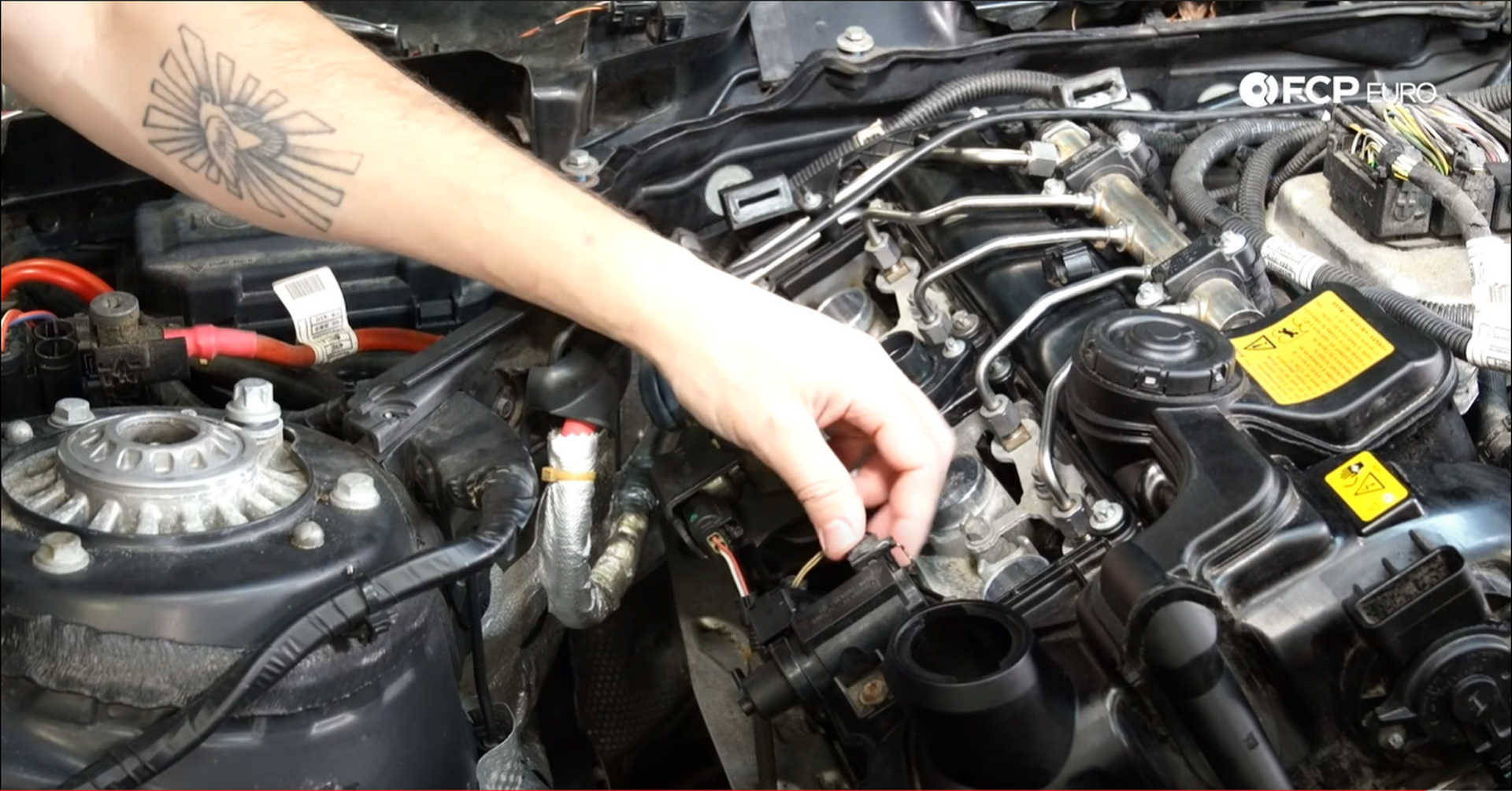 DIY BMW N20 Timing Chain plugging in the fuel pump and boost control solenoid
