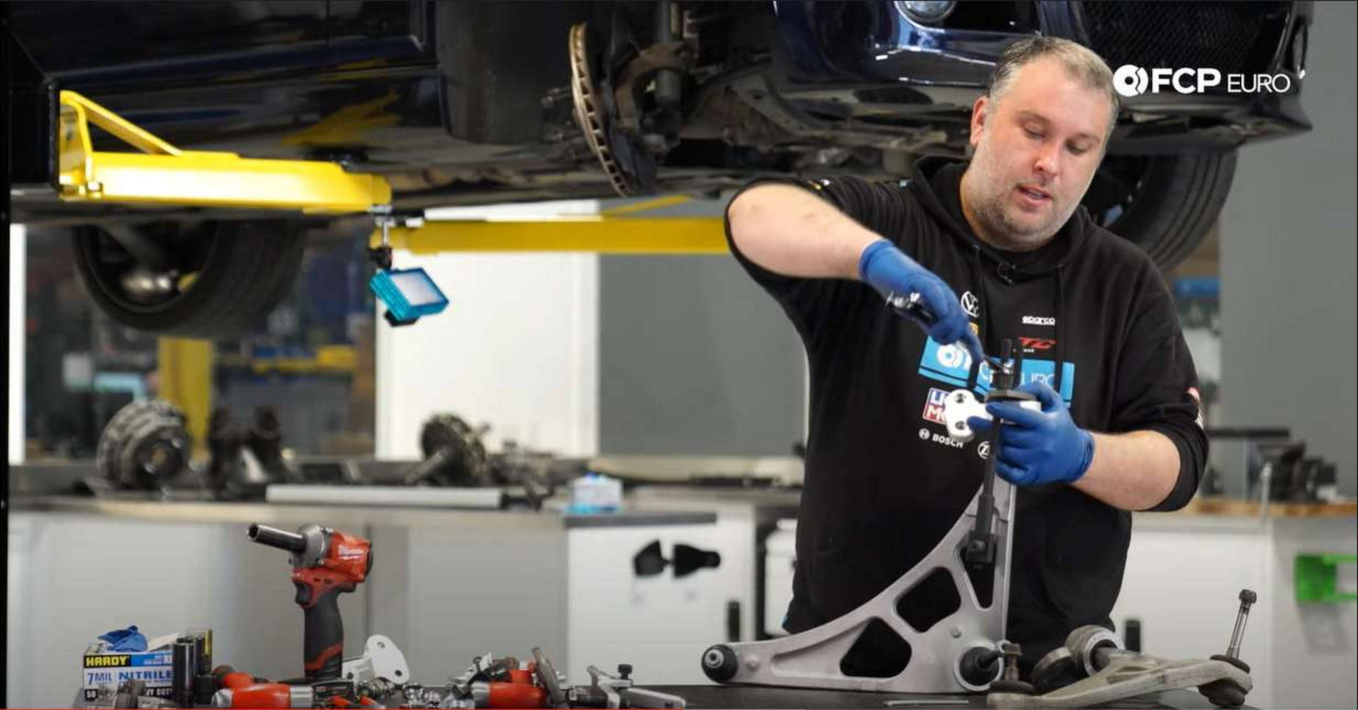 DIY BMW Front Suspension Refresh installing the new bushing
