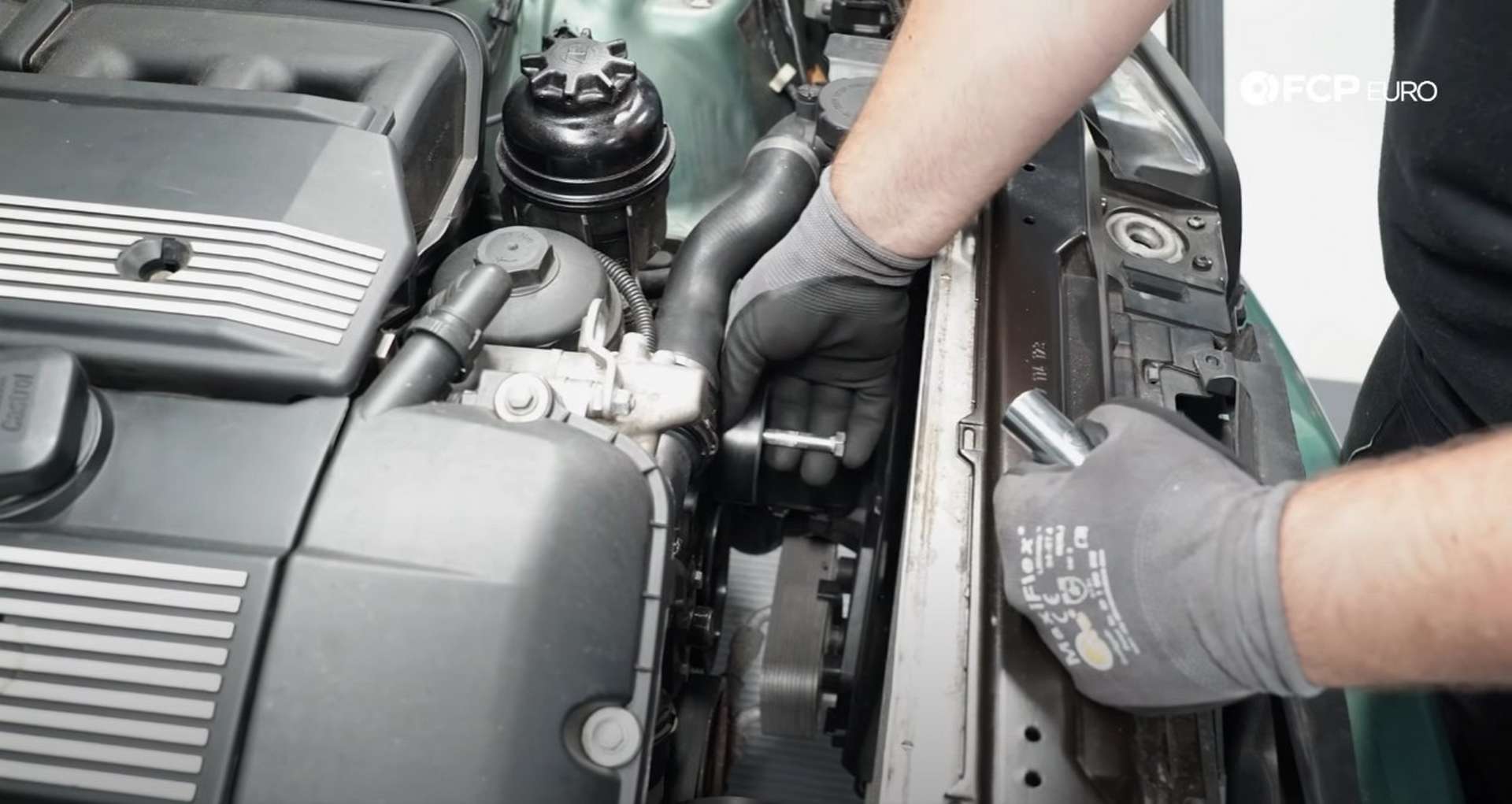 DIY BMW E46 Oil Filter Housing Gasket and VANOS Line Replacement removing the idler