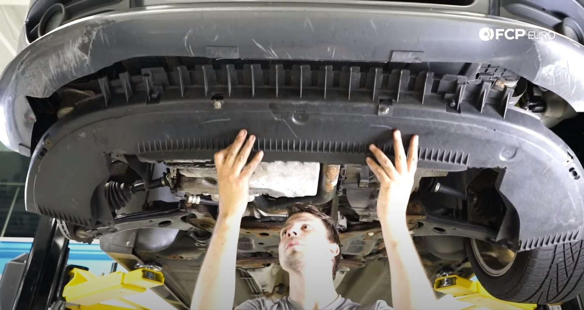 DIY Volvo P1 Timing Belt Replacement refitting the fender liner