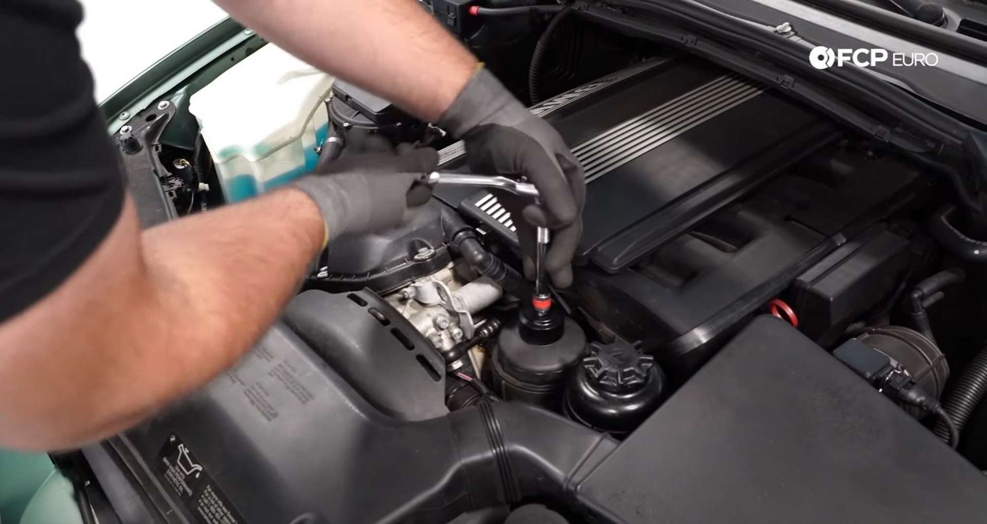 DIY BMW E46 Oil Filter Housing Gasket and VANOS Line Replacement loosening cap