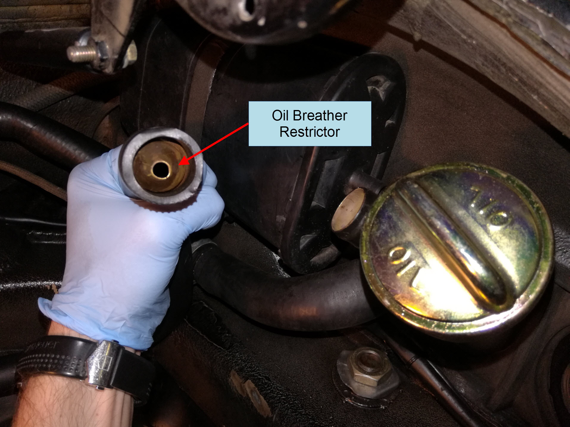 Porsche 911 oil breather restrictor location.