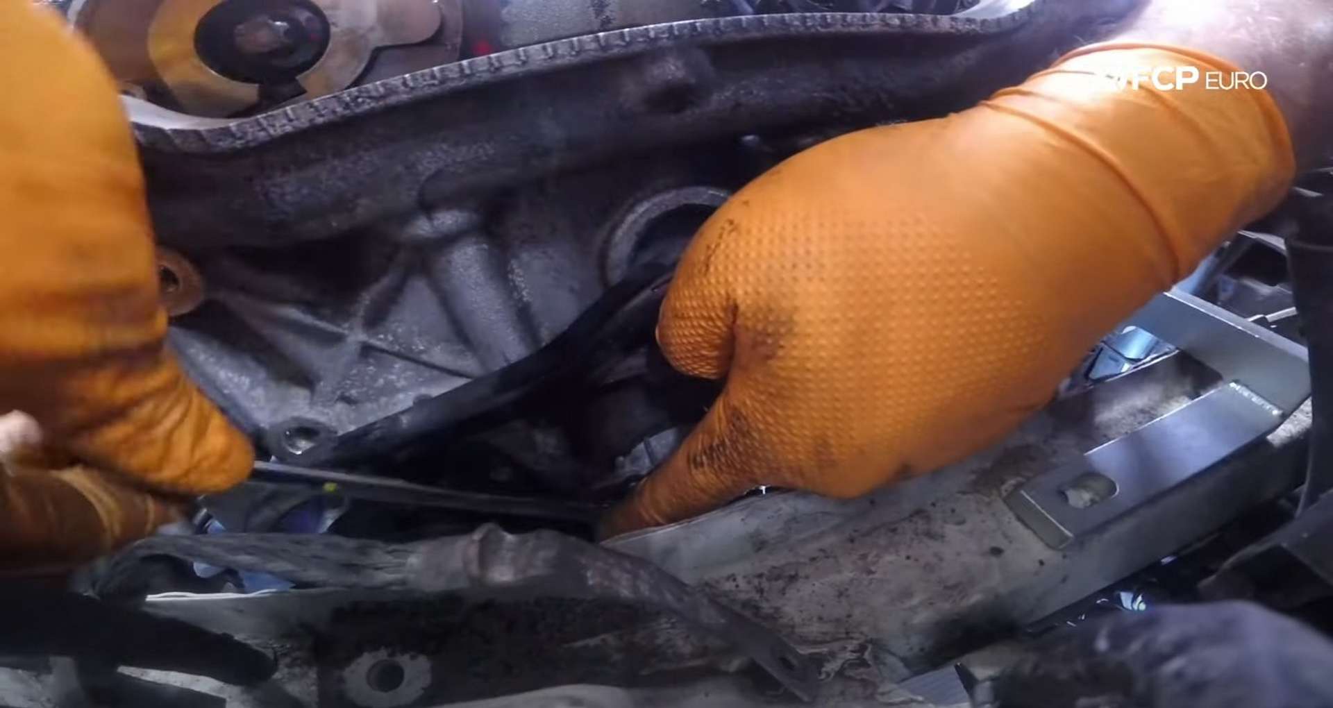 DIY MINI R56 Timing Chain Replacement installing the idler pulley