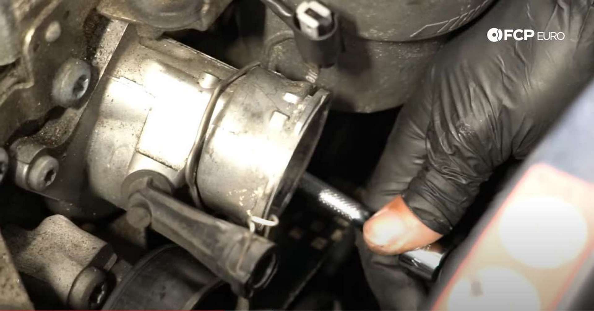 M156 Thermostat Replacement removing lower bolt