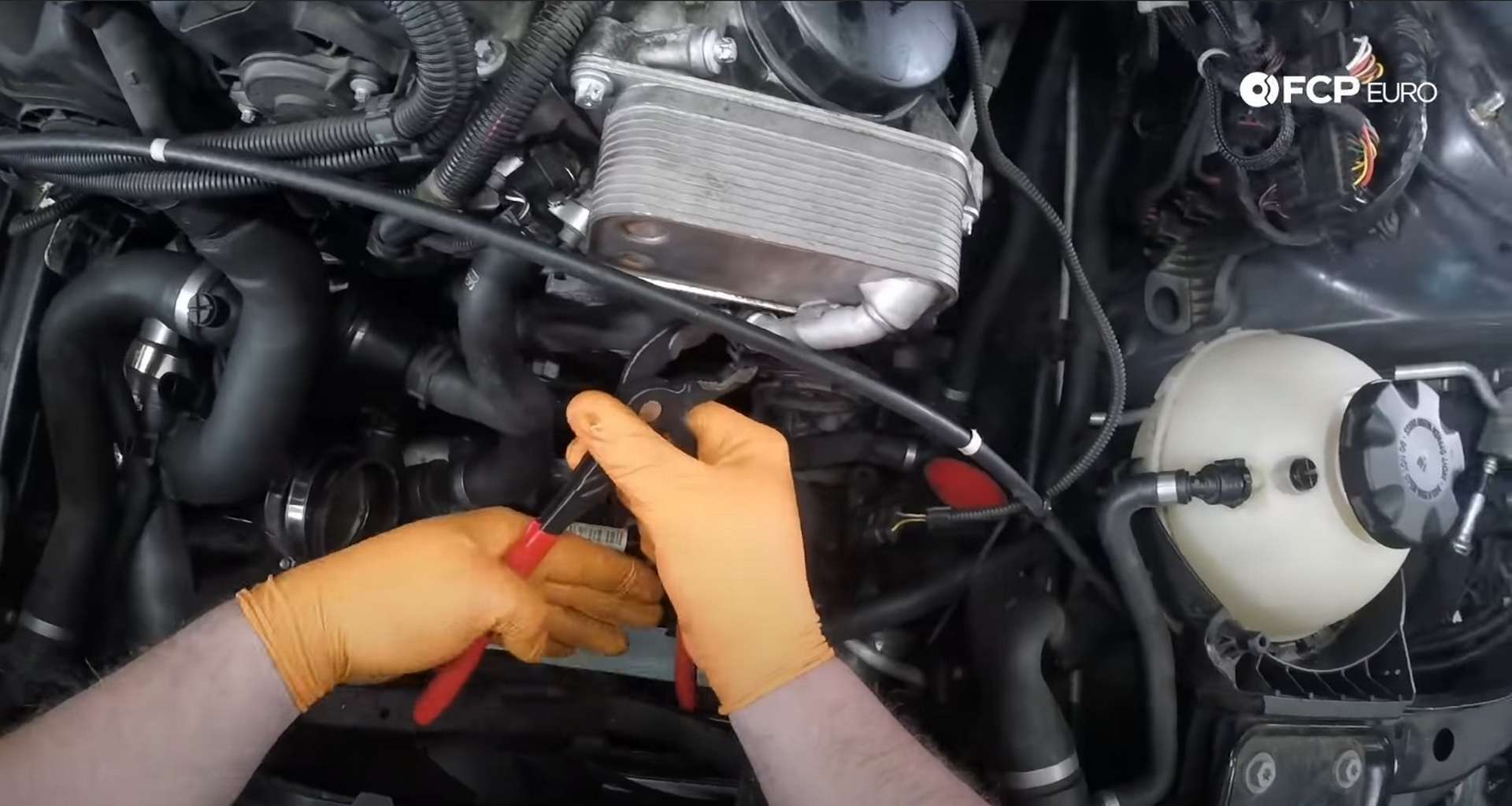 DIY BMW F30 Oil Filter Housing Gasket Replacement refitting the oil cooler line