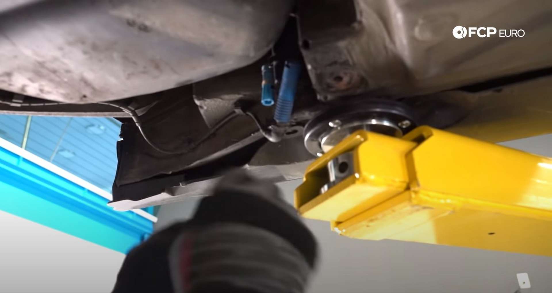 DIY E46 BMW M3 Rear Subframe Refresh Part 1 unplugging the wheel speed sensor