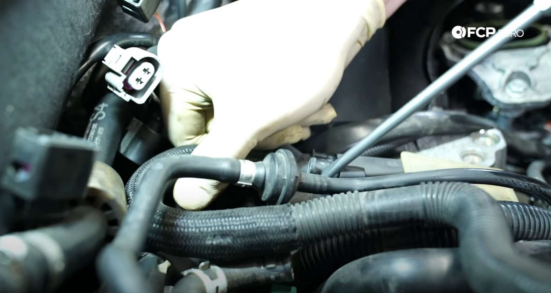 DIY Audi 3.0T PCV/AOS Replacement separating the breather lines from the PCV housing