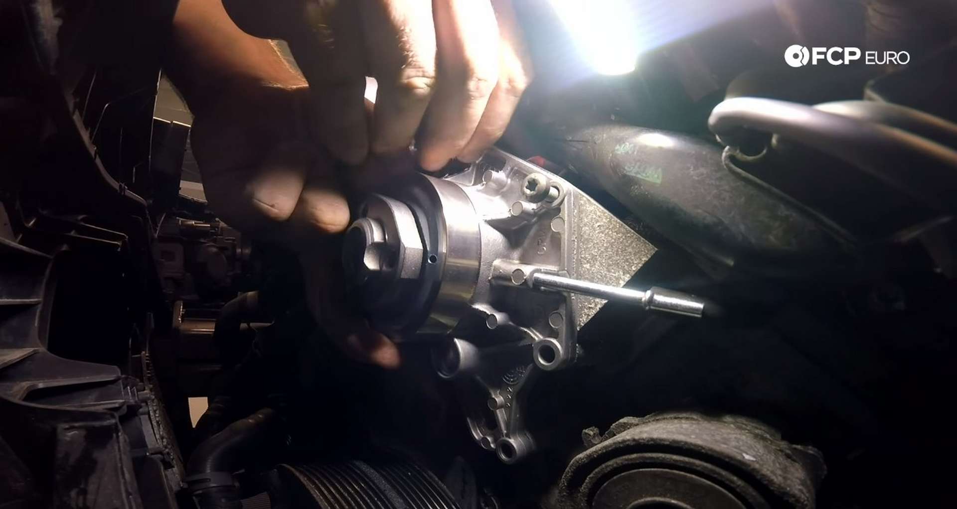 DIY Audi B8.5 Water Pump and Thermostat Replacement installing the water pump