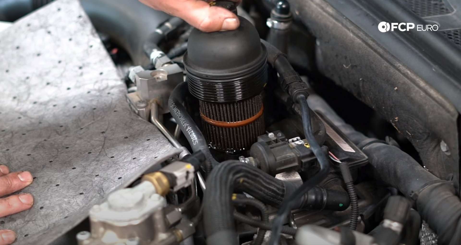 DIY Audi 4.2L V8 Oil Change draining the oil from the oil filter