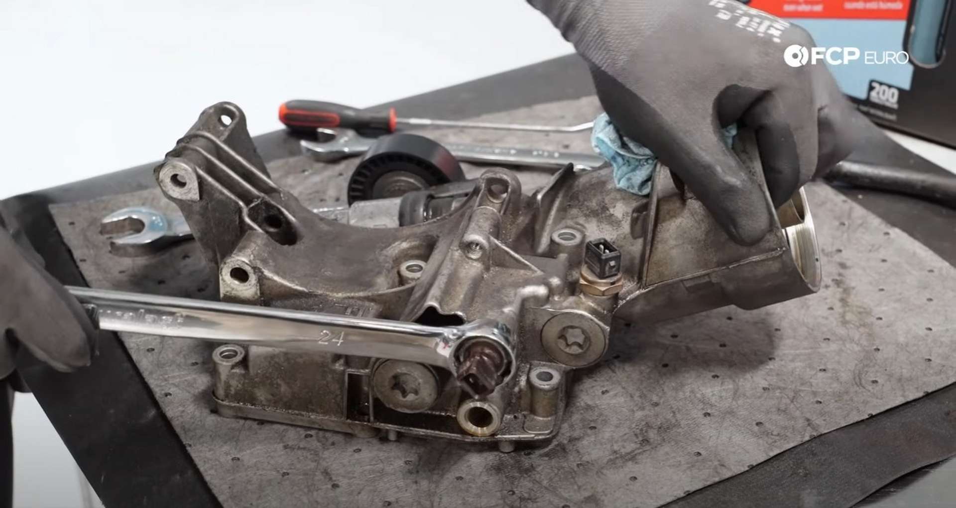 DIY BMW E46 Oil Filter Housing Gasket and VANOS Line Replacement removing the oil pressure switch