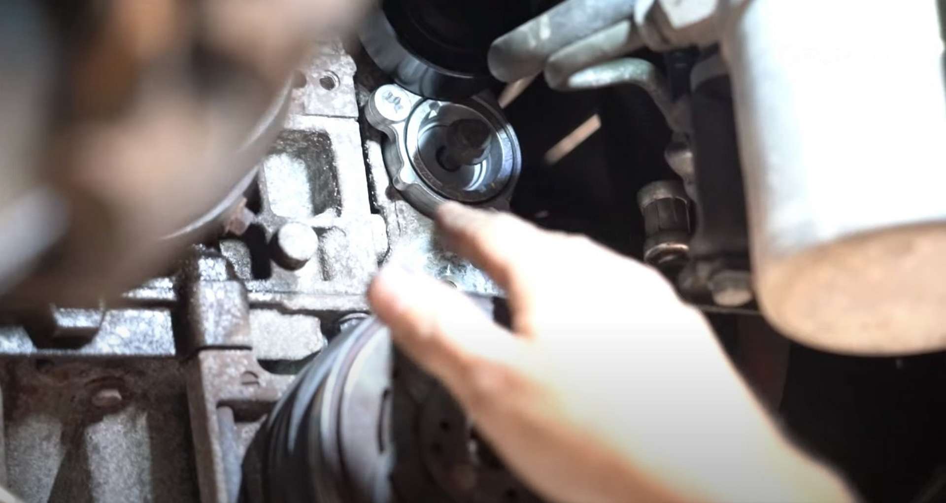 DIY Volvo Alternator and Serpentine Belt Replacement reinstalling the inner tensioner bolt