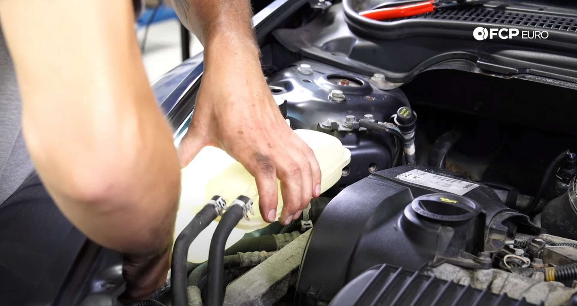 DIY Volvo P1 Timing Belt Replacement refitting the coolant expansion tank