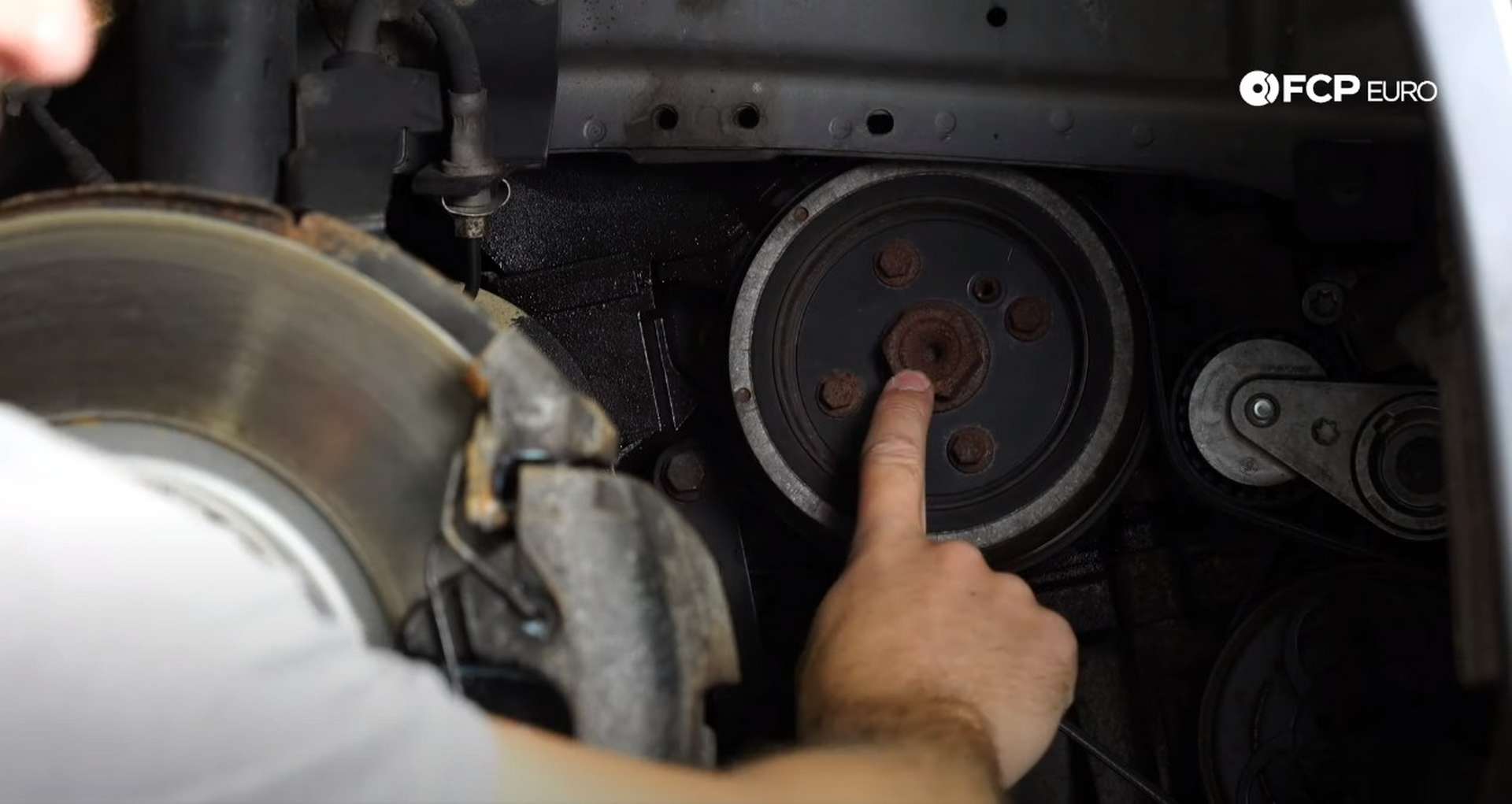 DIY Volvo P1 Timing Belt Replacement showing the 30mm nut
