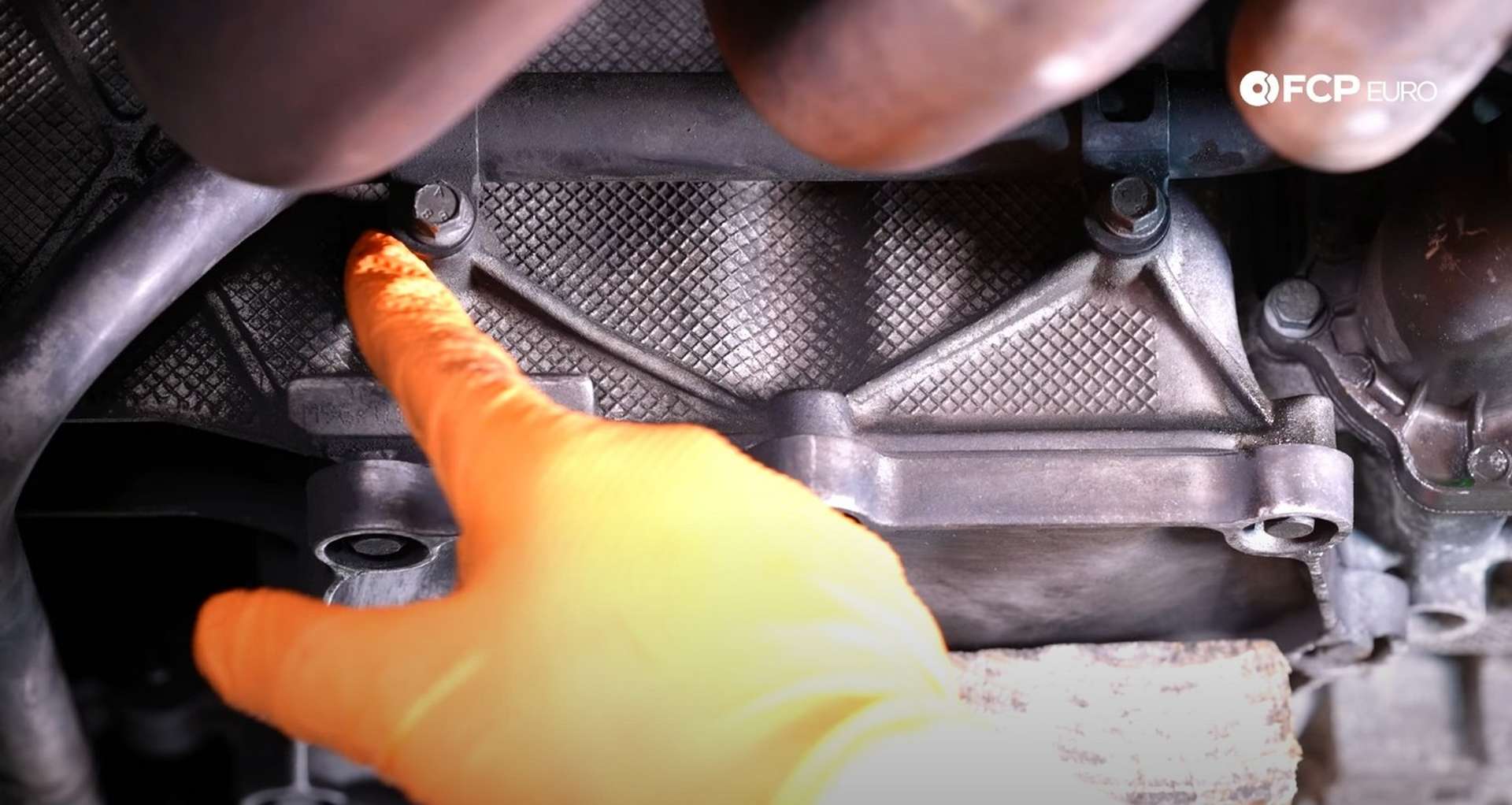 DIY Porsche 996 911 Water Pump And Thermostat Replacement coolant pipe side mounting bolts