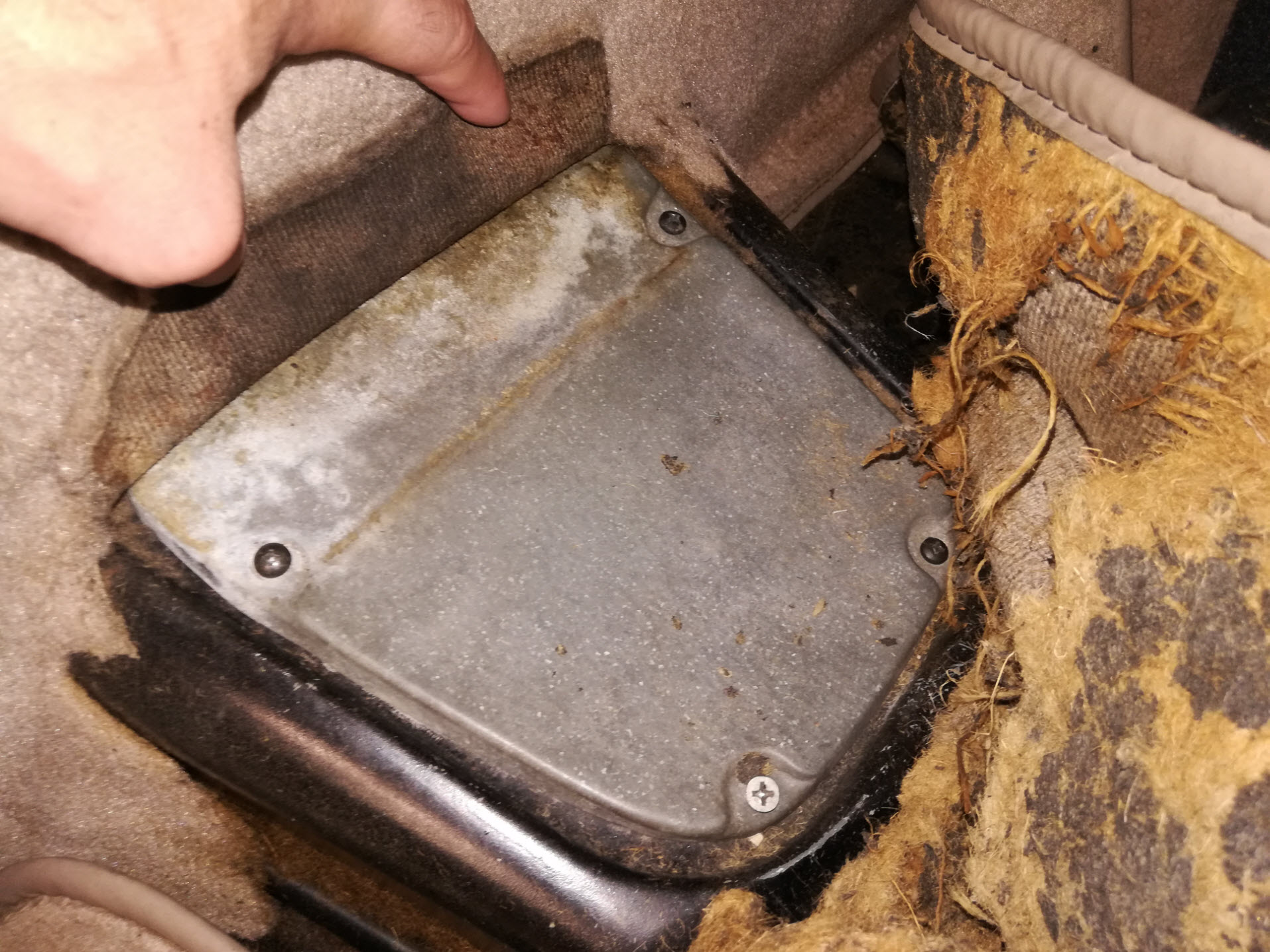 Air-cooled Porsche 911 shift coupler access panel.