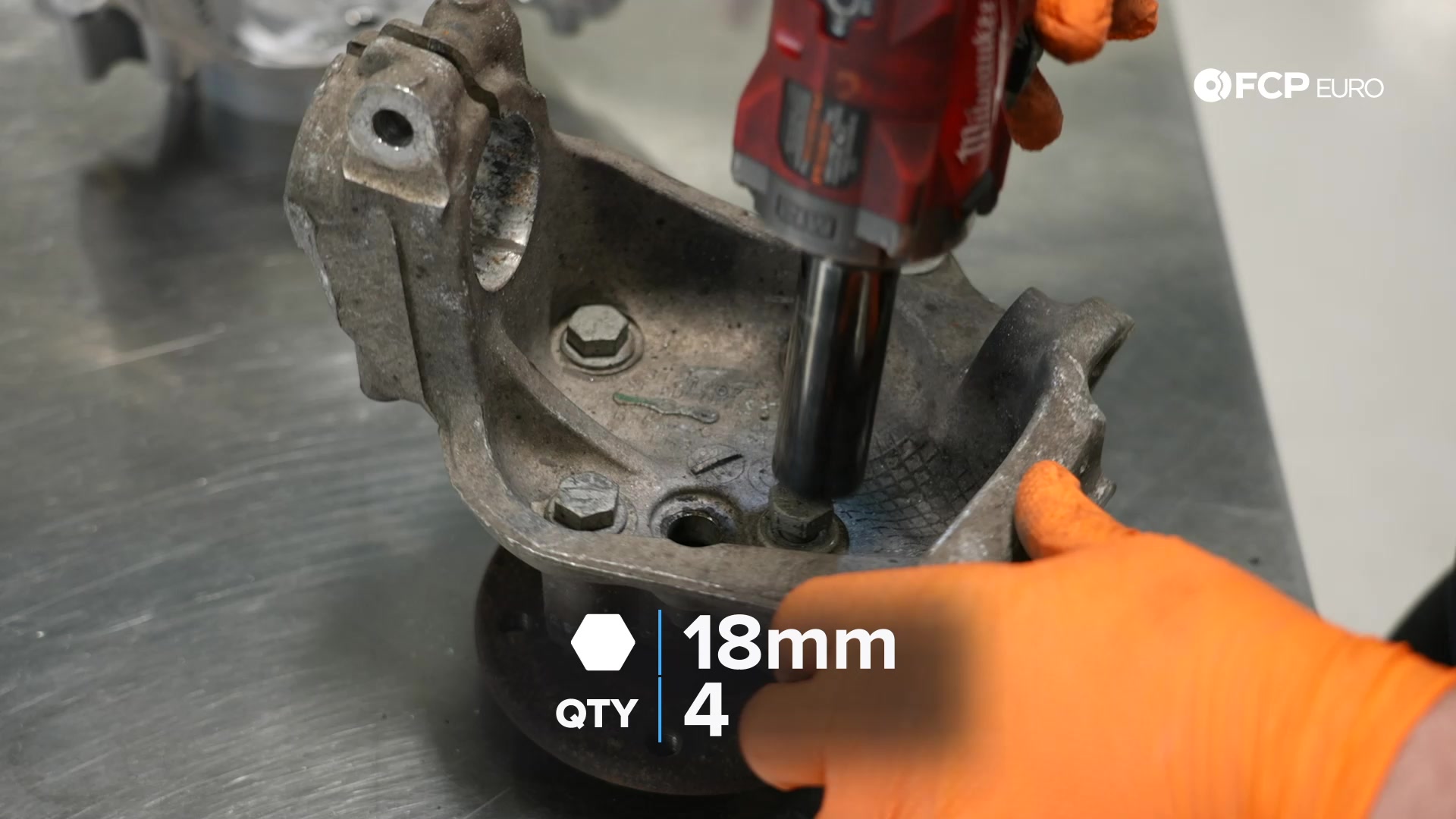 DIY BMW E90 Steering Knuckle Replacement removing the wheel bearing from the old knuckle