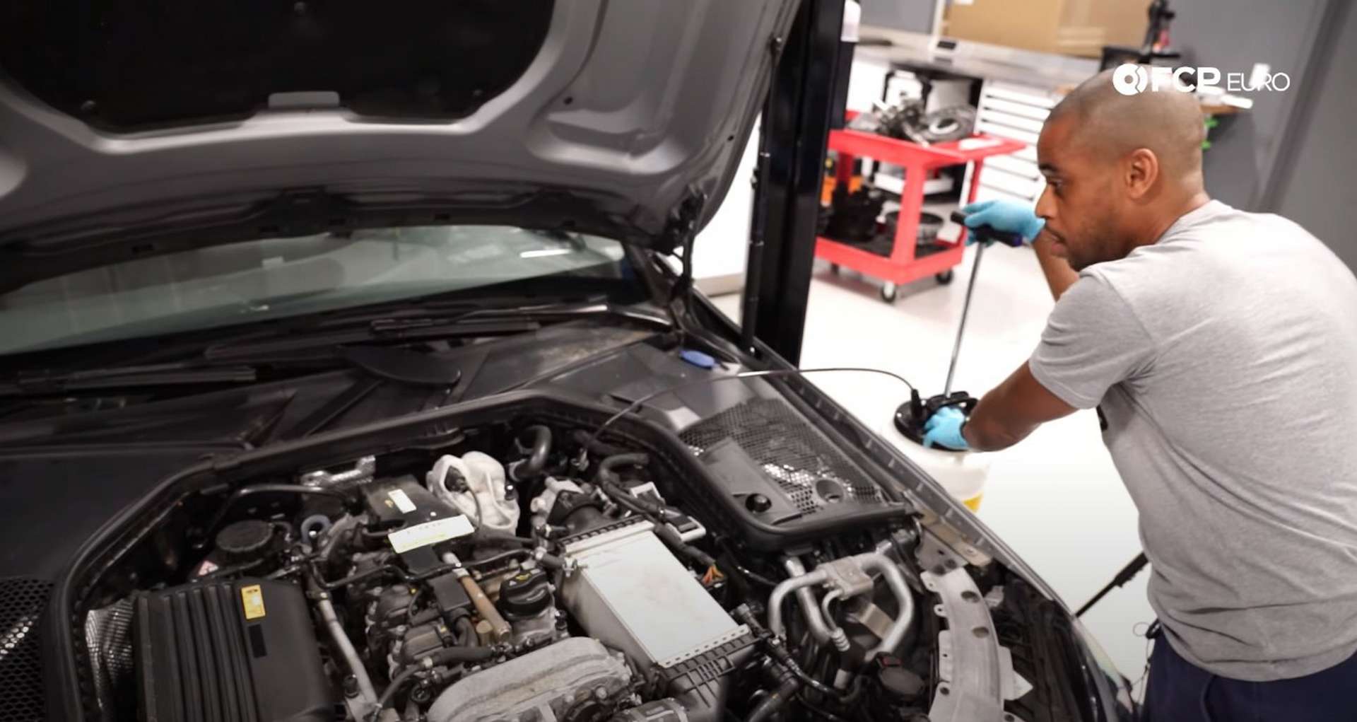 DIY Mercedes M274 Oil Change extracting the oil
