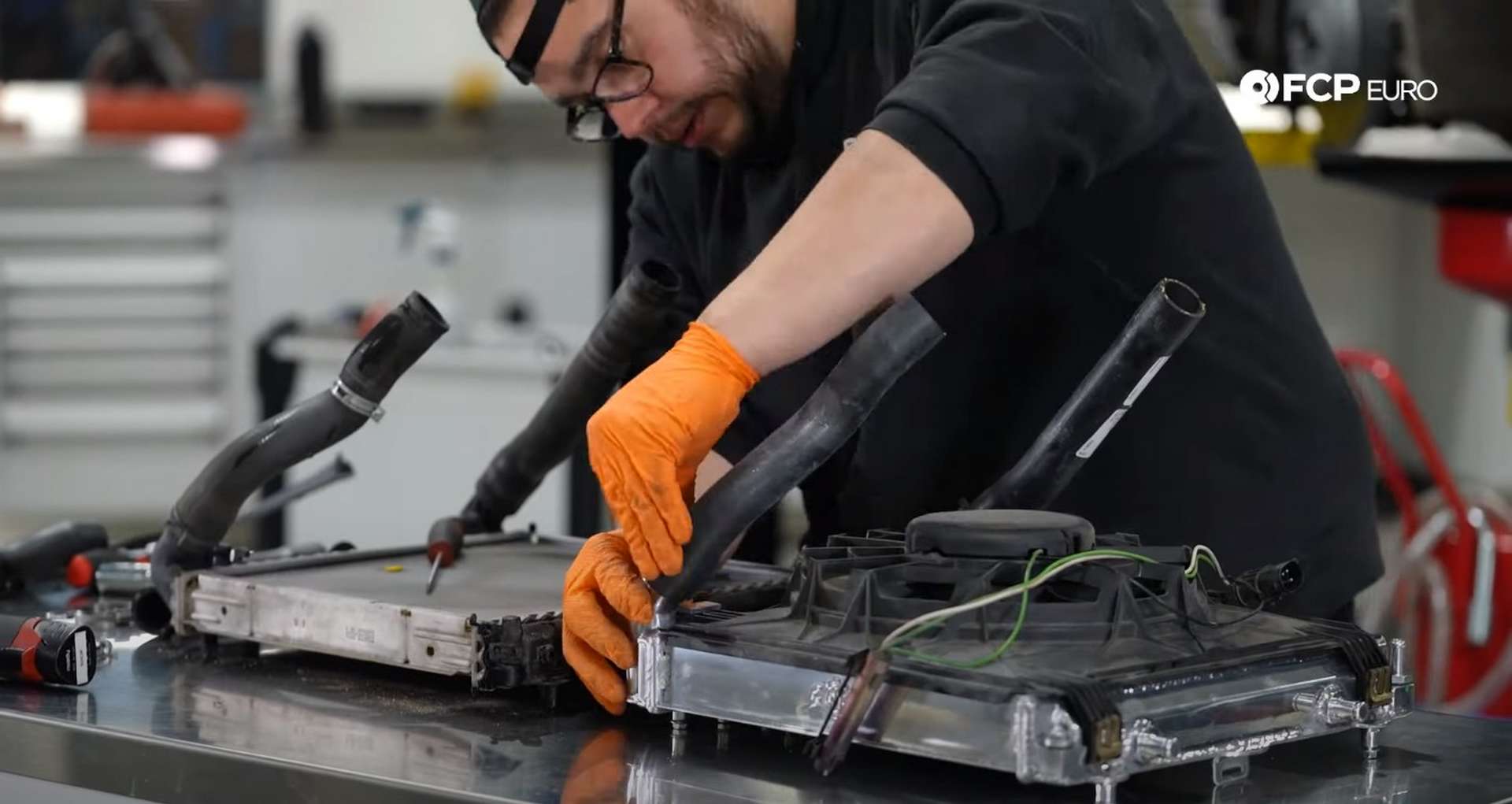 DIY Porsche 996 Radiator Replacement installing the new hoses