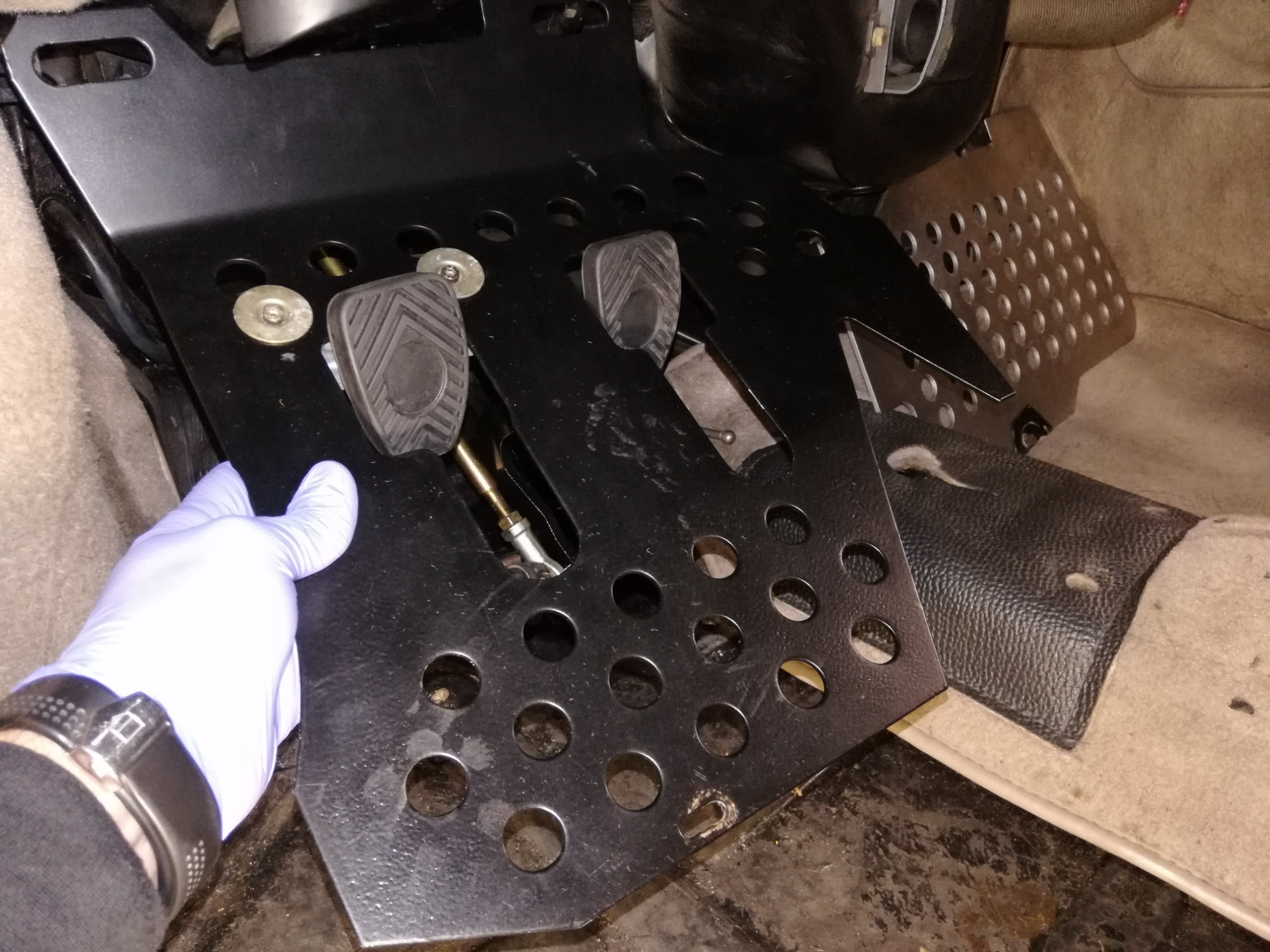 Air-cooled Porsche 911 pedal floorboard removal.