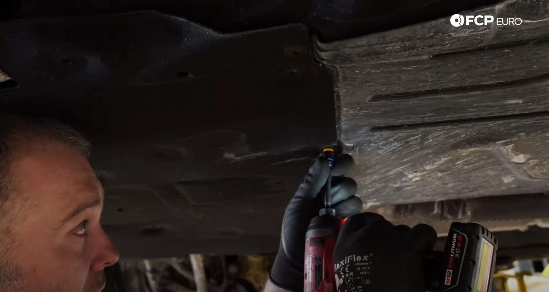 DIY BMW F30 Radiator Replacement loosening removing the upper radiator fastener