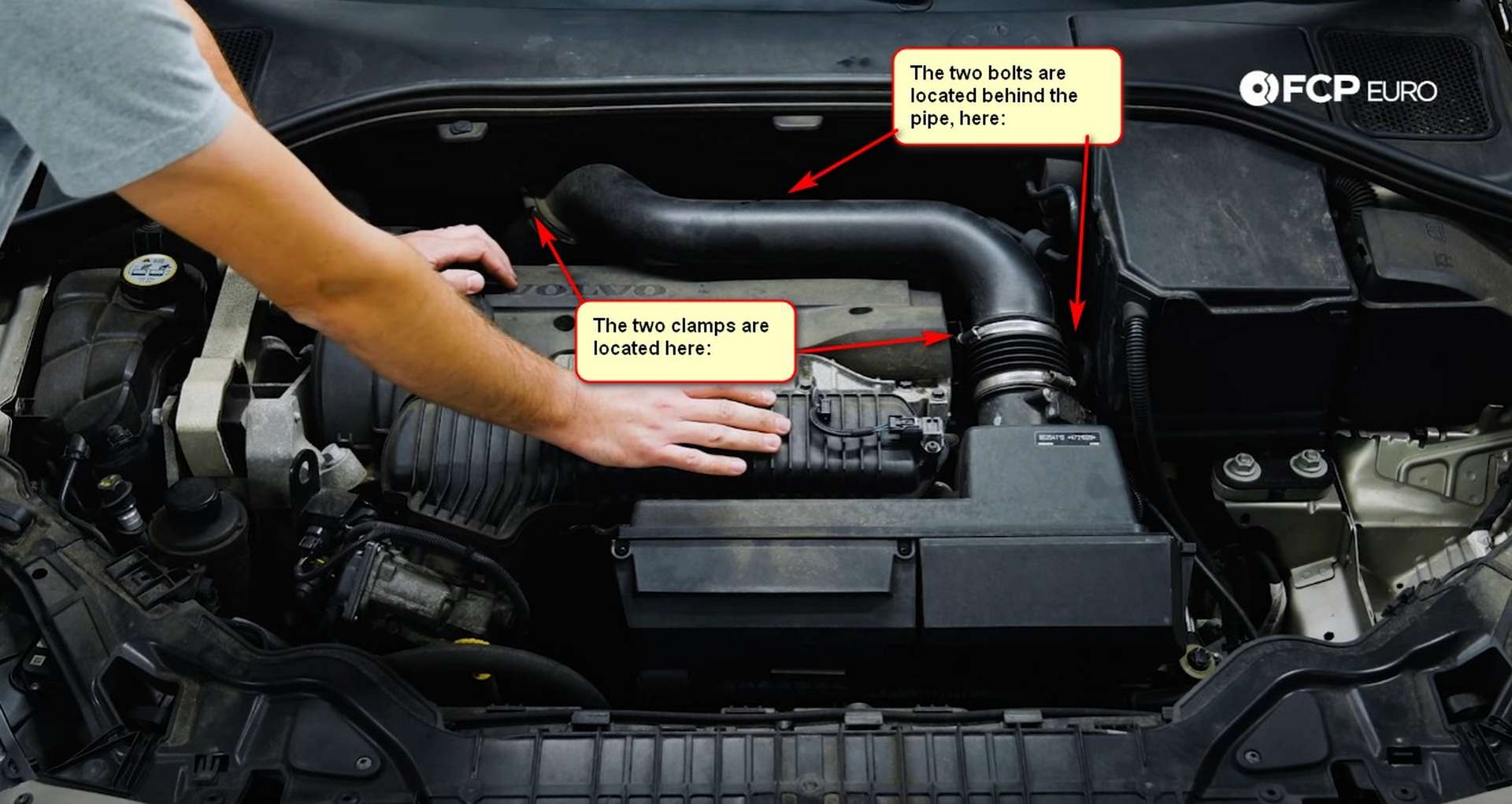 DIY Volvo Spark Plug and Ignition Coil Replacement intake hose clamp and mounting bolt locations