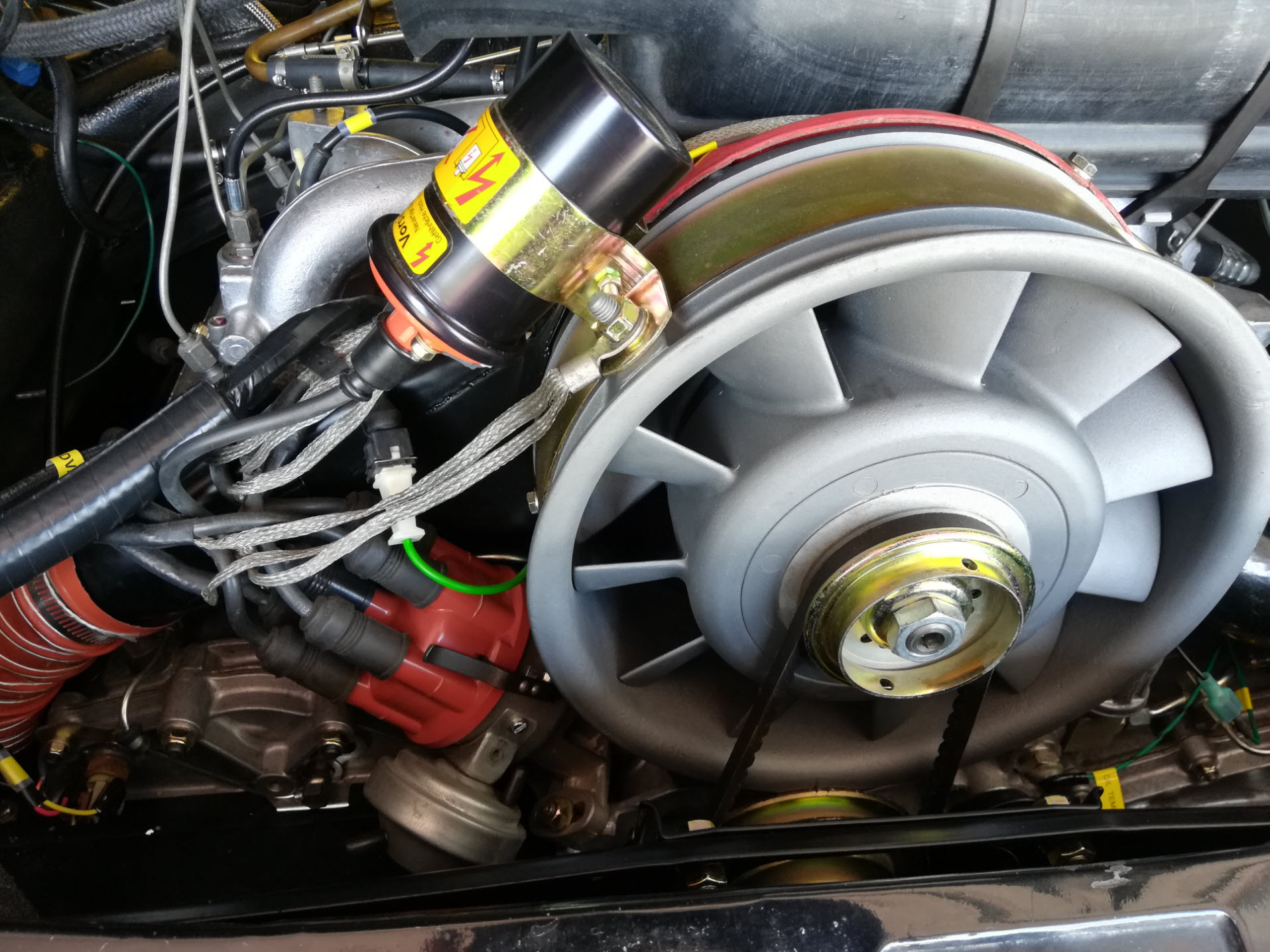 Air-cooled Porsche 911 distributor location.