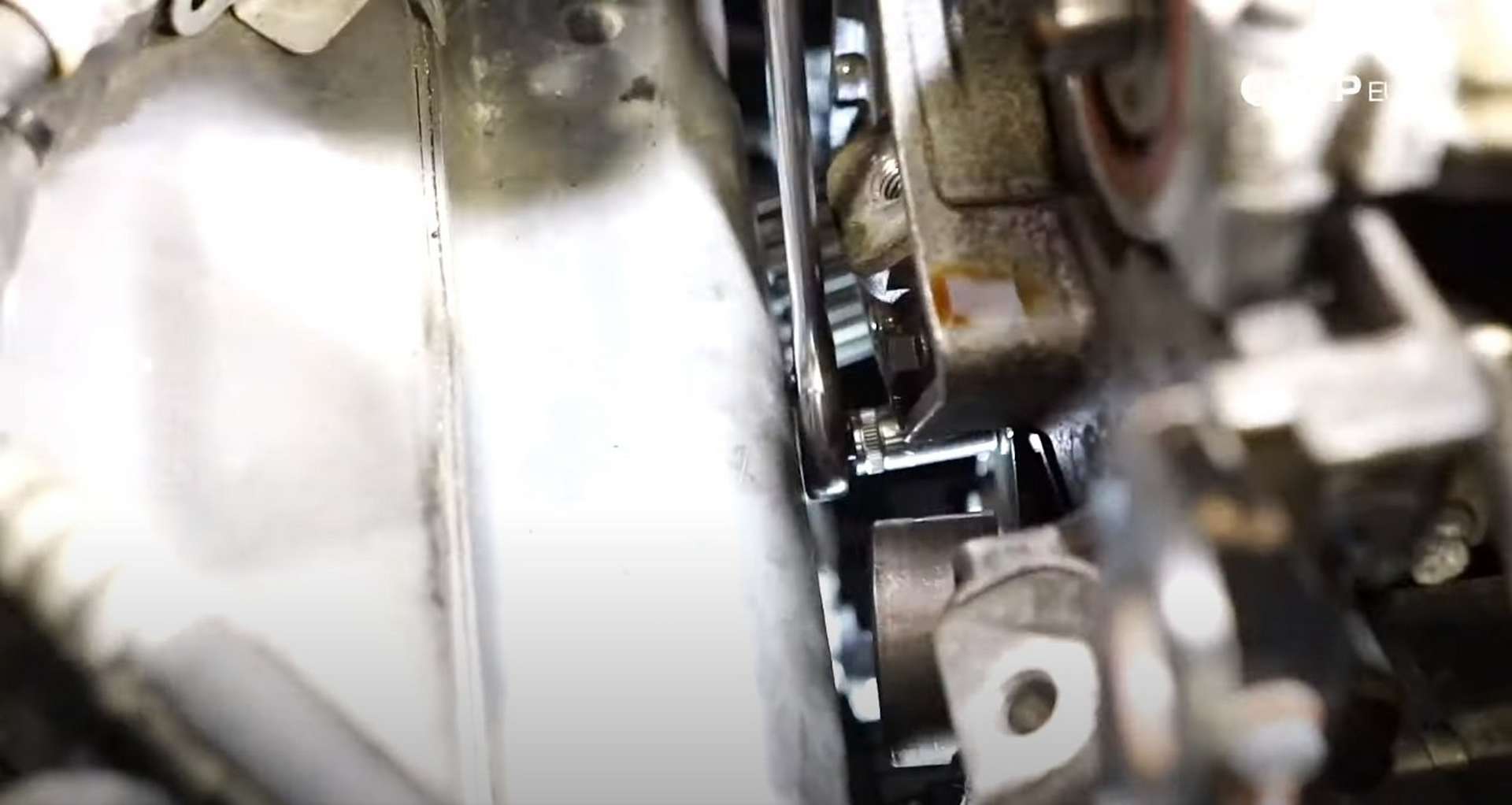 DIY Volvo P1 Water Pump Replacement removing the main timing belt idler