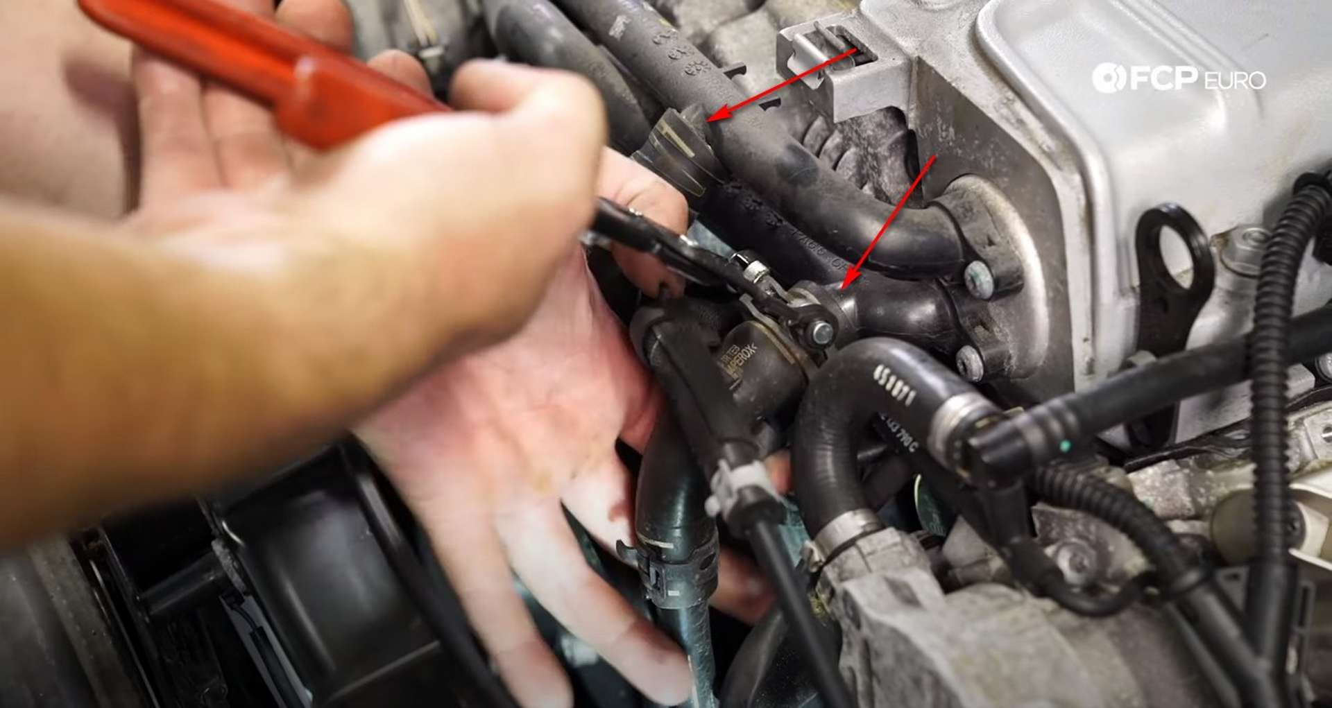 DIY Audi B8.5 Water Pump and Thermostat Replacement removing the coolant lines from the supercharger
