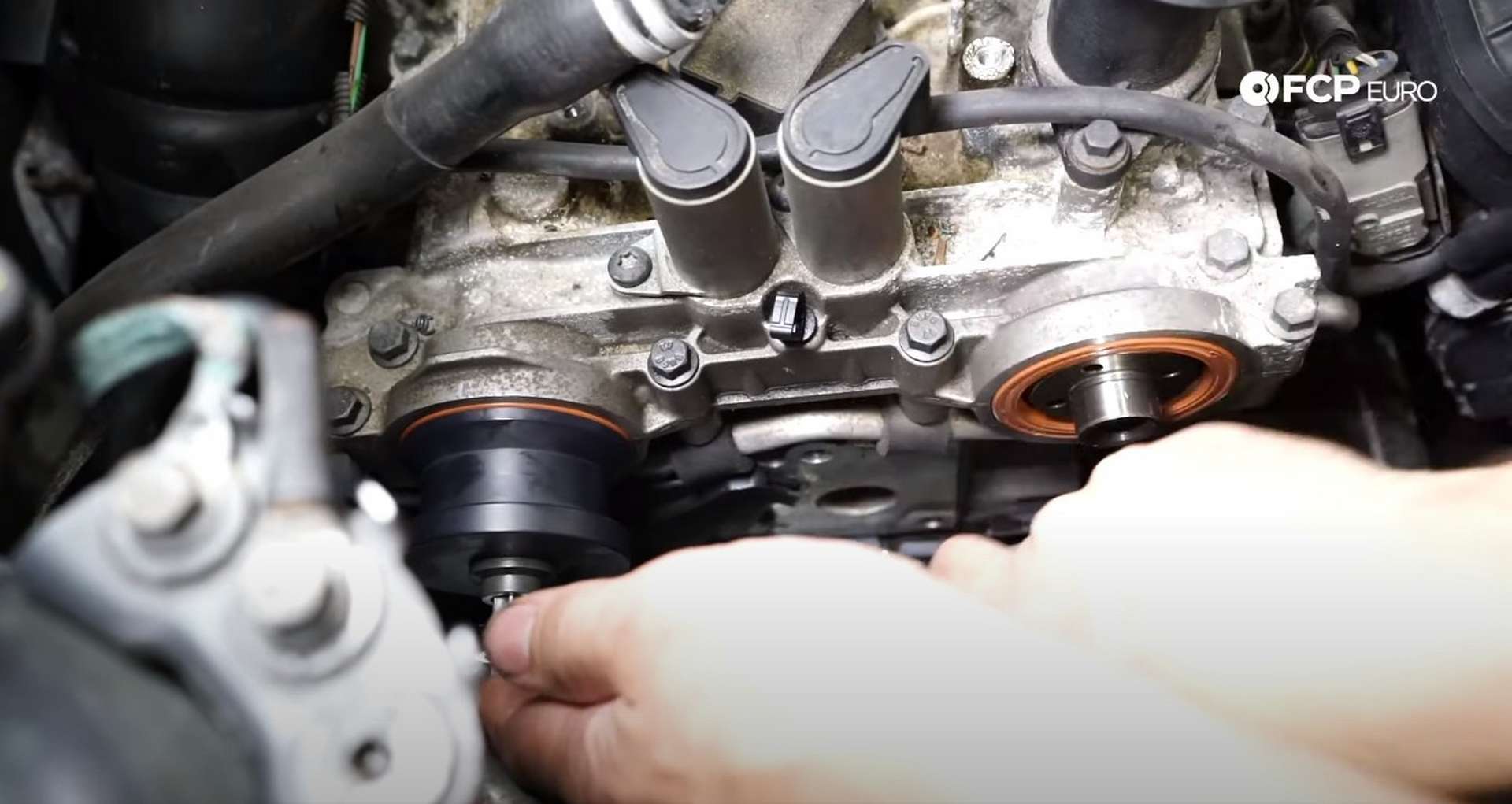 DIY Volvo P1 Water Pump Replacement installing the new camshaft seals