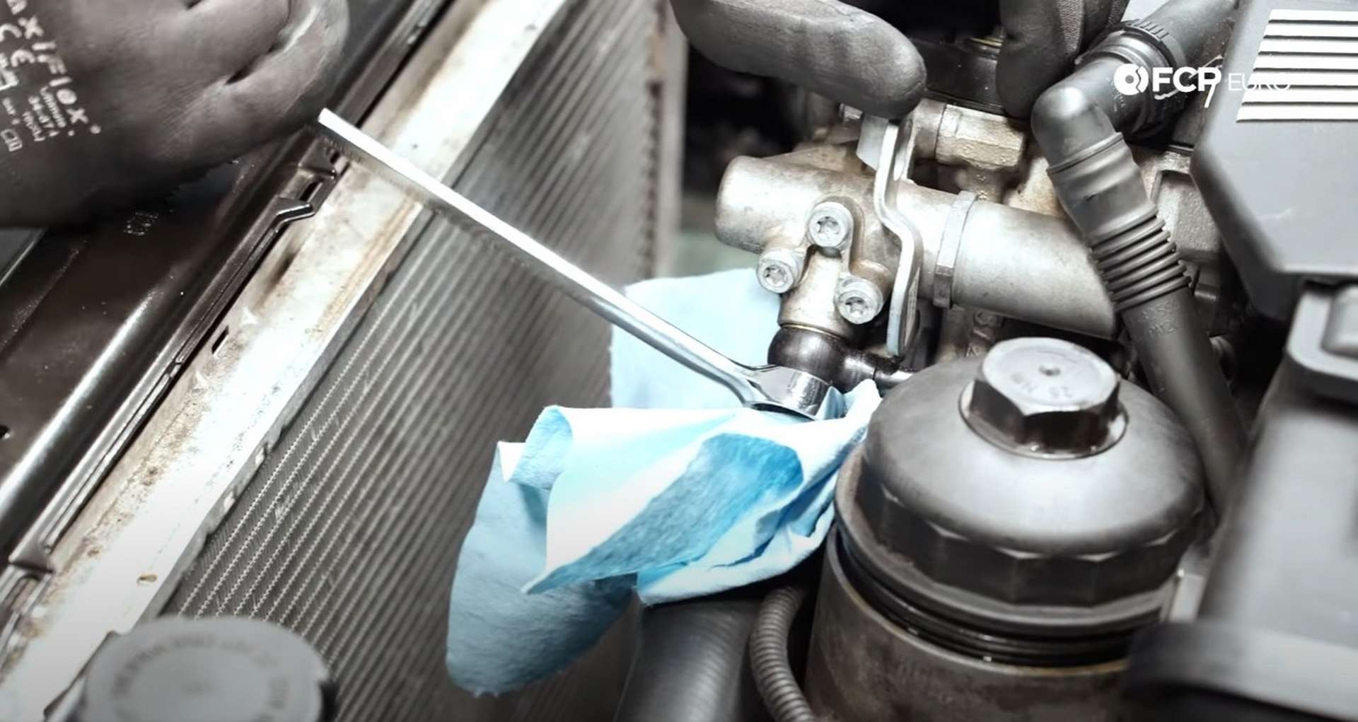 DIY BMW E46 Oil Filter Housing Gasket and VANOS Line Replacement removing the VANOS line banjo bolt