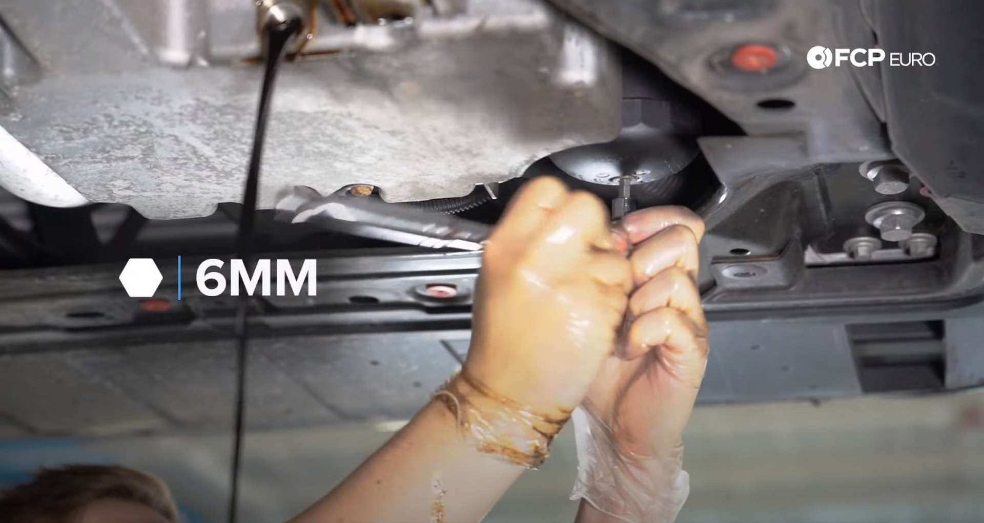 DIY Volvo SPA Oil Change removing the oil filter housing drain plug