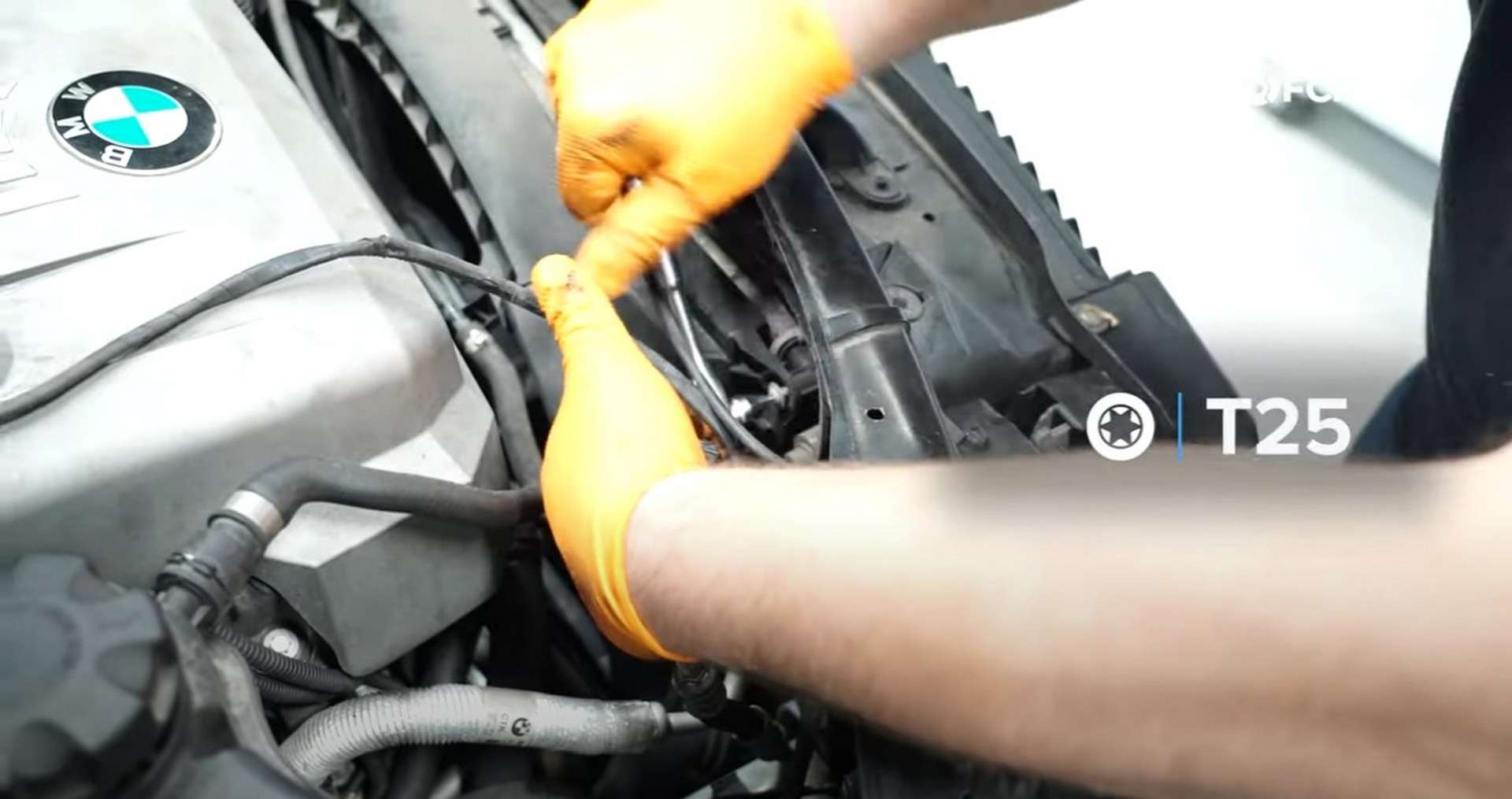 DIY BMW N52 Drive Belt Replacement removing the fan shroud fastener