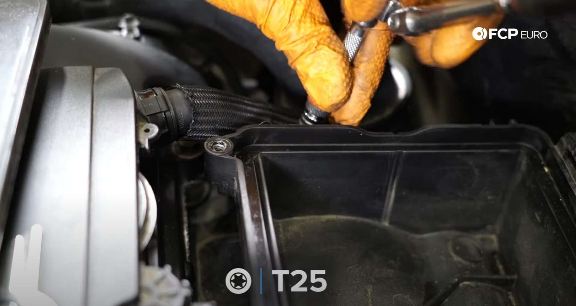 DIY MINI R56 Timing Chain Replacement securing the airbox
