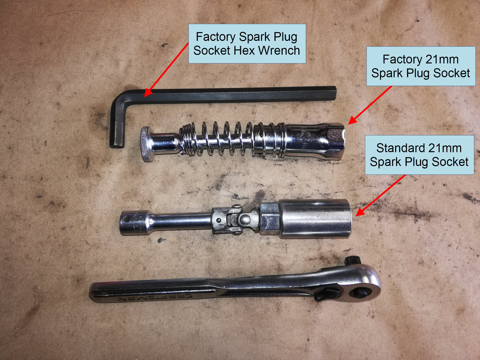 Air-cooled Porsche 911 spark plug removal tools.