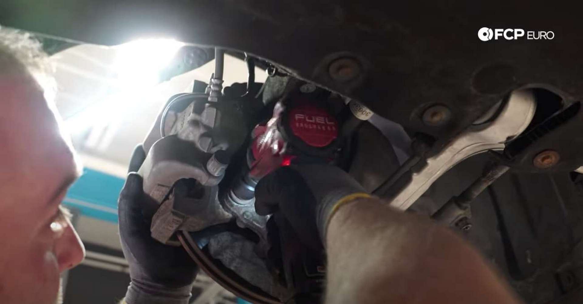 DIY BMW F30 Front Wheel Bearing Replacement tightening the caliper bracket bolts
