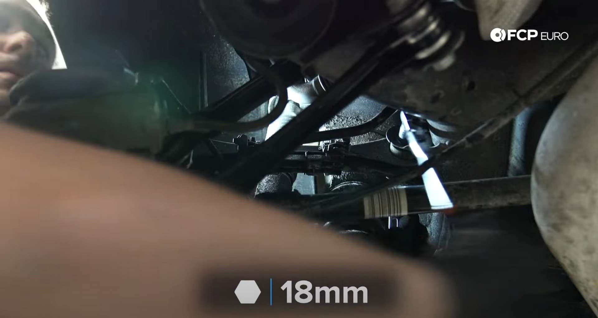 DIY BMW F30 Rear Control Arm Replacement loosening the rear upper mounting bolt