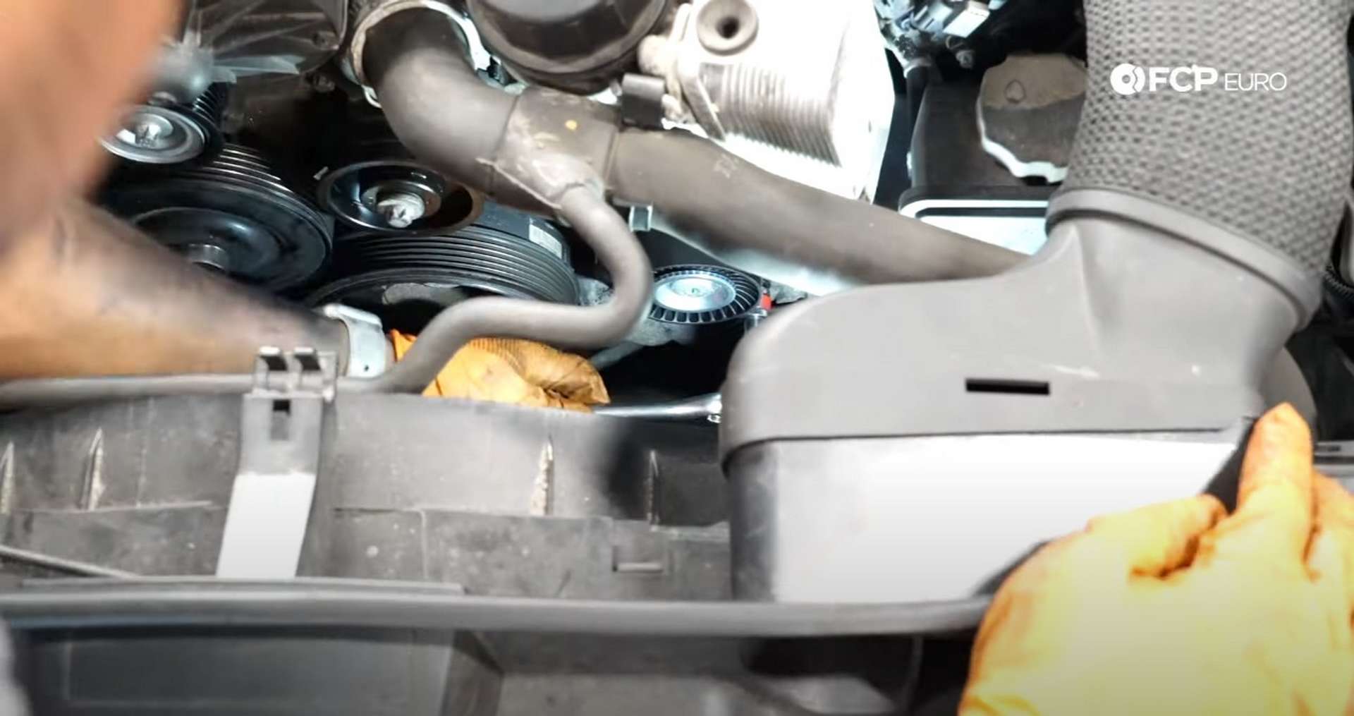 DIY Mercedes W212/204 Alternator and Drive Belt Replacement installing the belt tensioner]