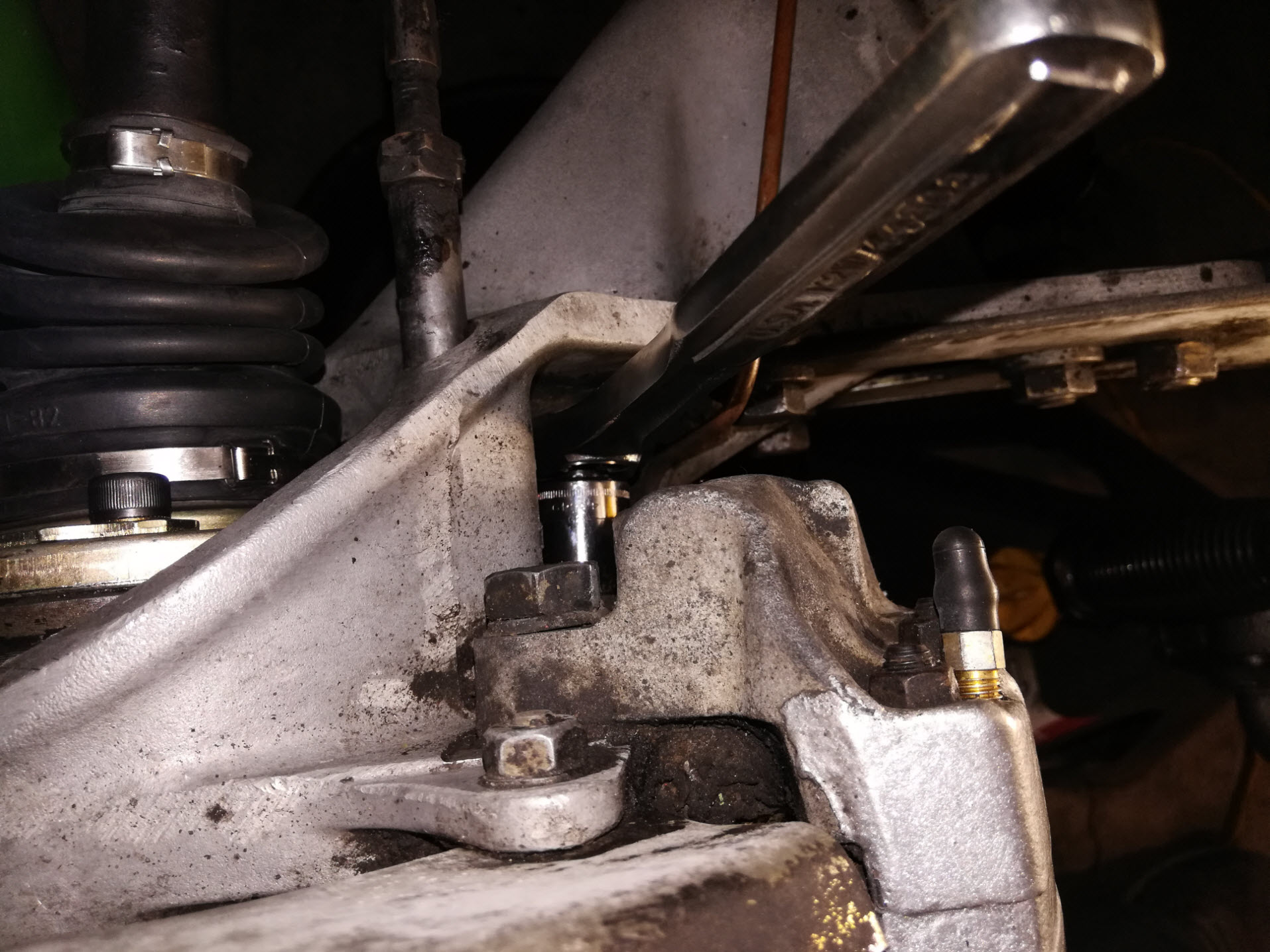 Air-cooled Porsche 911 rear brake caliper removal.