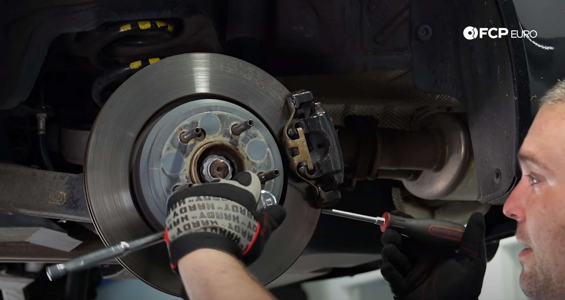 DIY E46 BMW M3 Rear Subframe Refresh Part 1 removing the rotor's set screw