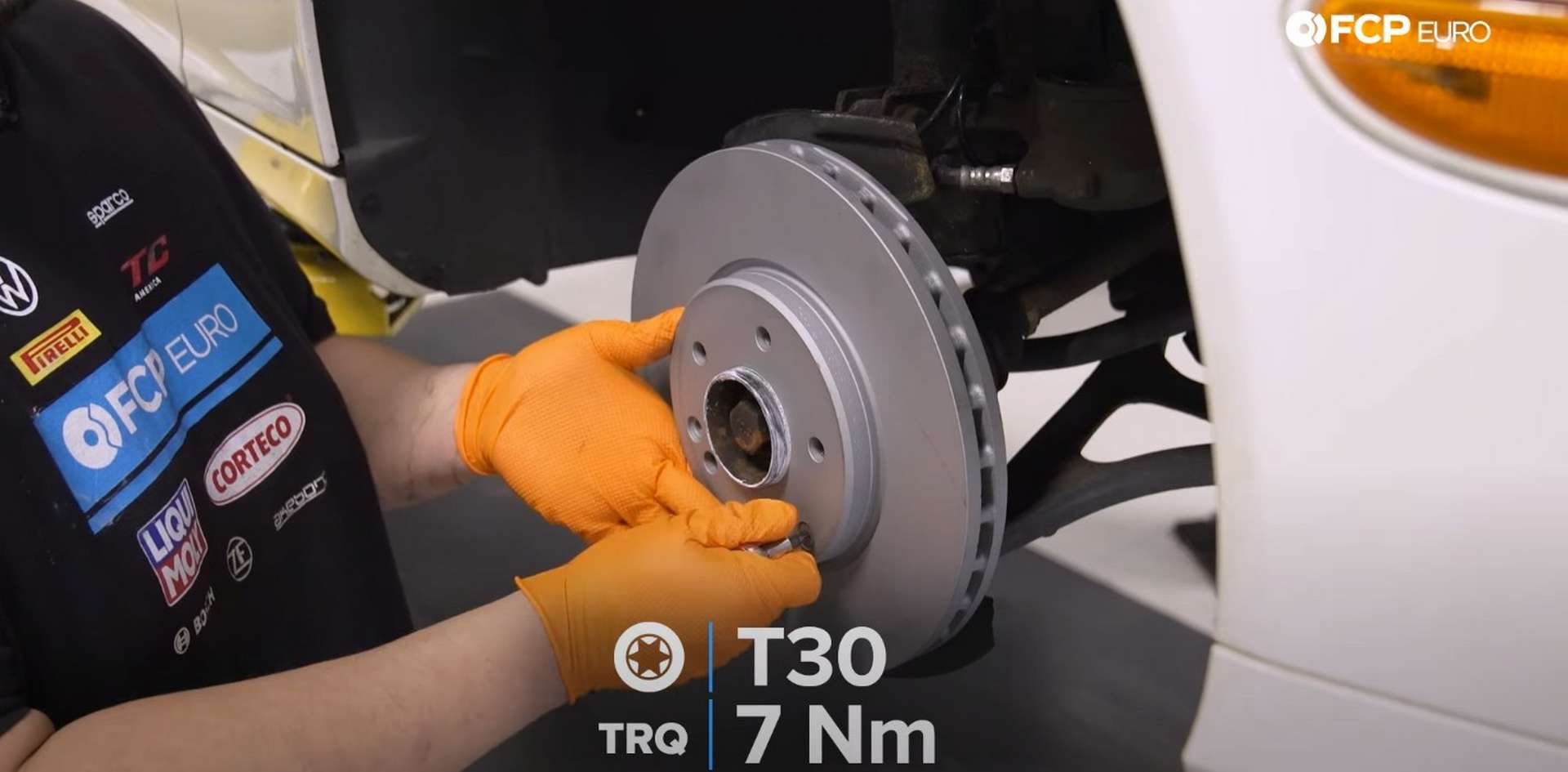 DIY Mercedes W203 Front Brake Service tightening the rotor’s set screw