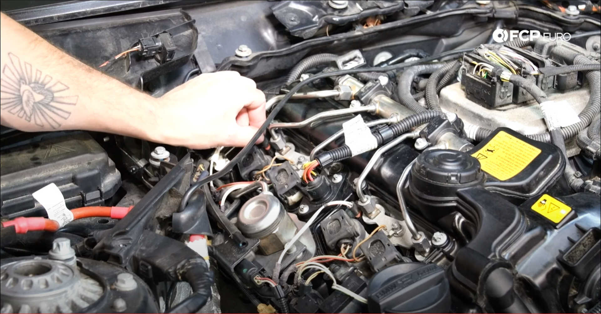 DIY BMW N20 Timing Chain plugging in the fuel injectors