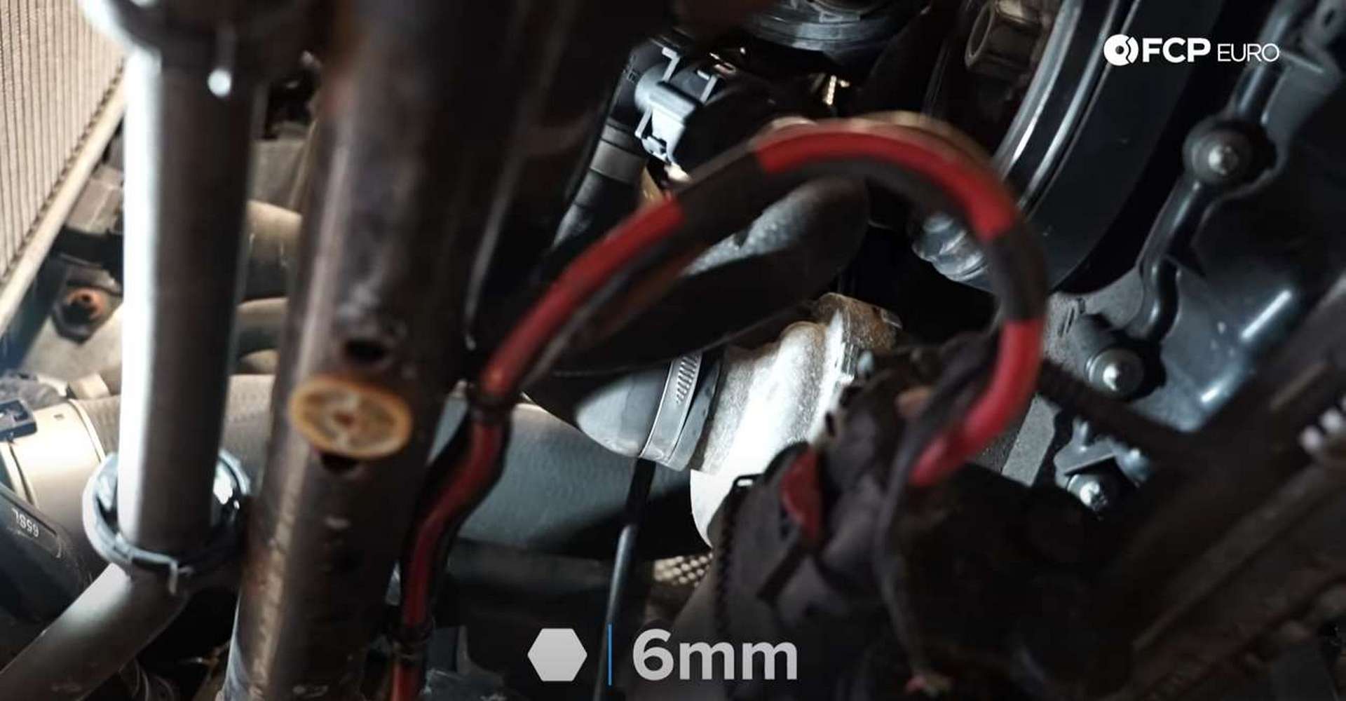 DIY BMW F30 Radiator Replacement removing the fan assembly