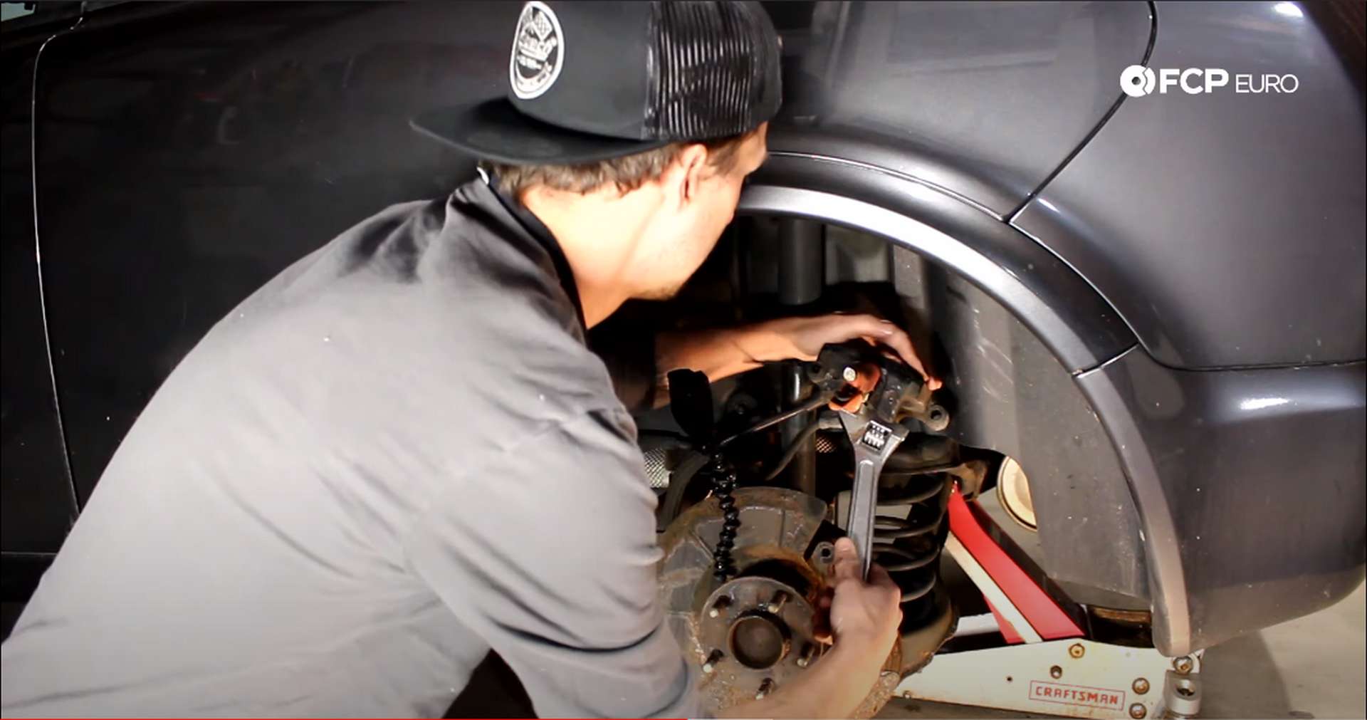 DIY Volvo Rear Brake Job turning pliers with the wrench