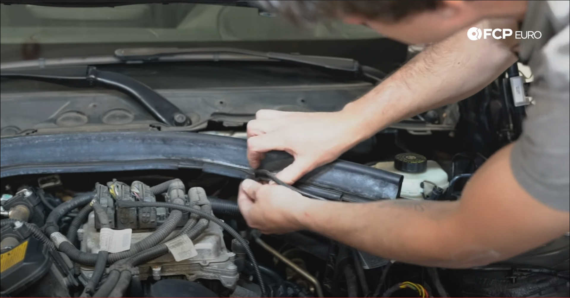 DIY BMW N20 Timing Chain running the cable through the hood seal