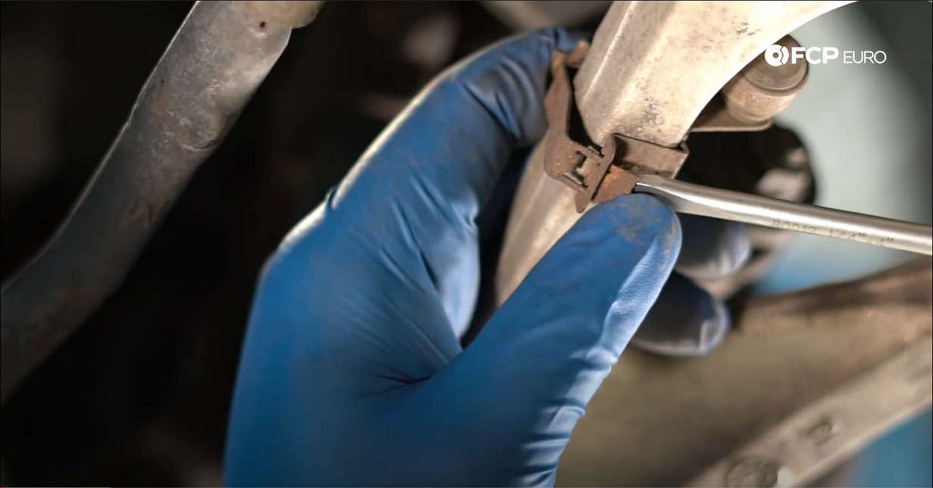 DIY BMW Front Suspension Refresh removing headlight sensor