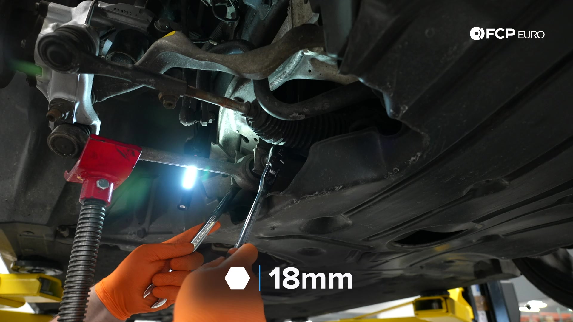 DIY BMW E90 Steering Knuckle Replacement tightening the toe arm’s inner bolt