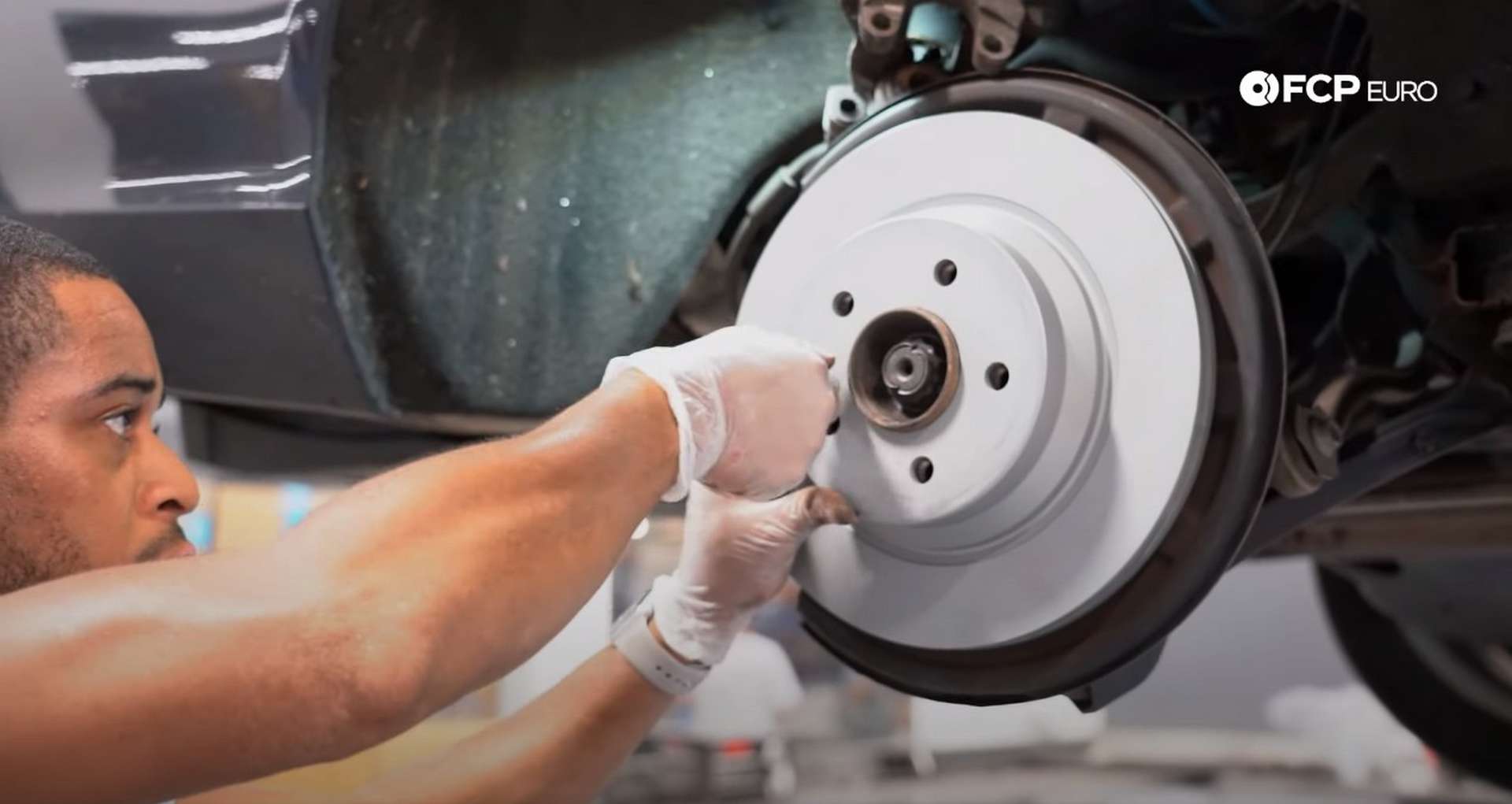 DIY Mercedes W211/212 Rear Brake Job installing the new rotor